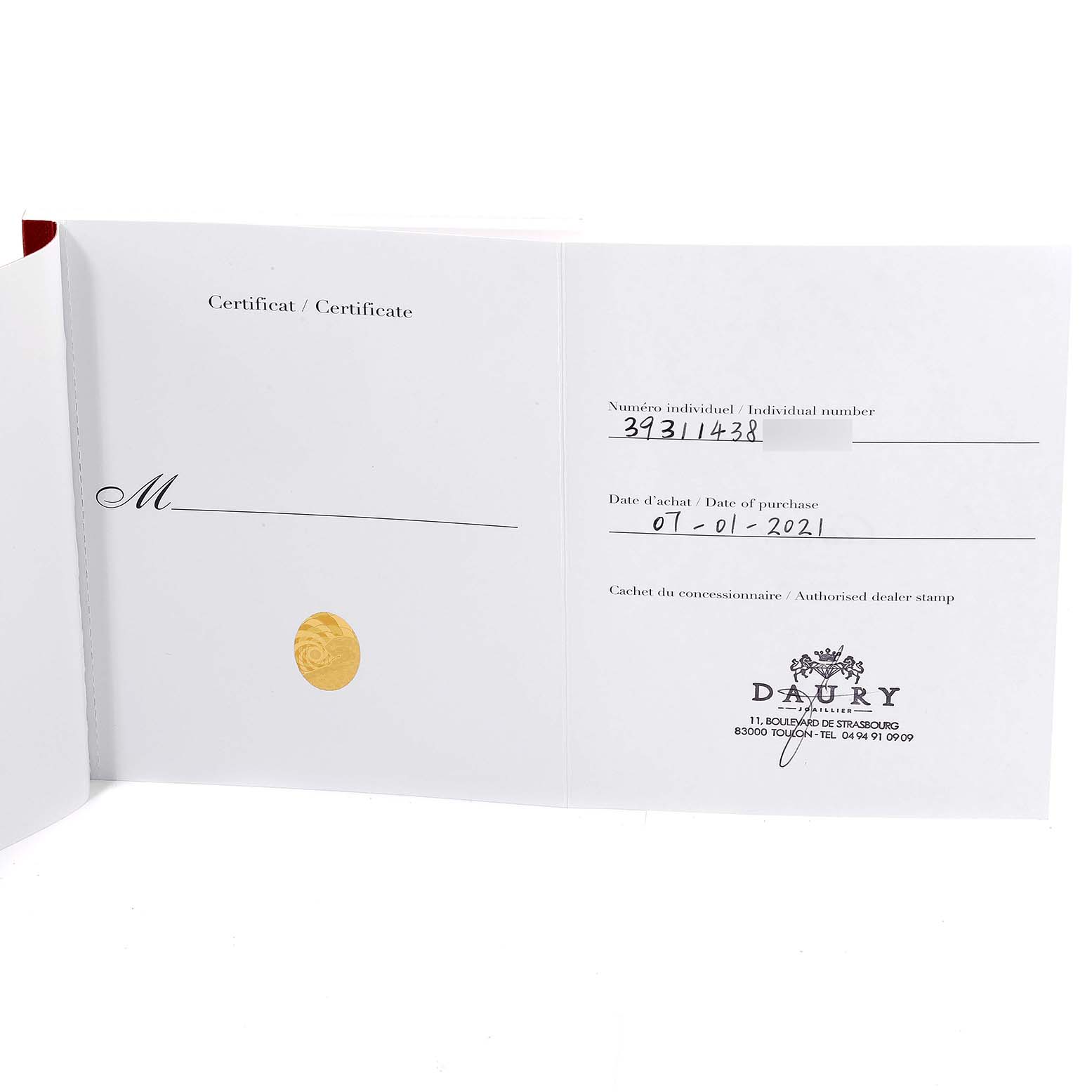 This image shows the warranty certificate for the Drive de Cartier watch by Cartier, including the individual number, purchase date, and dealer stamp.