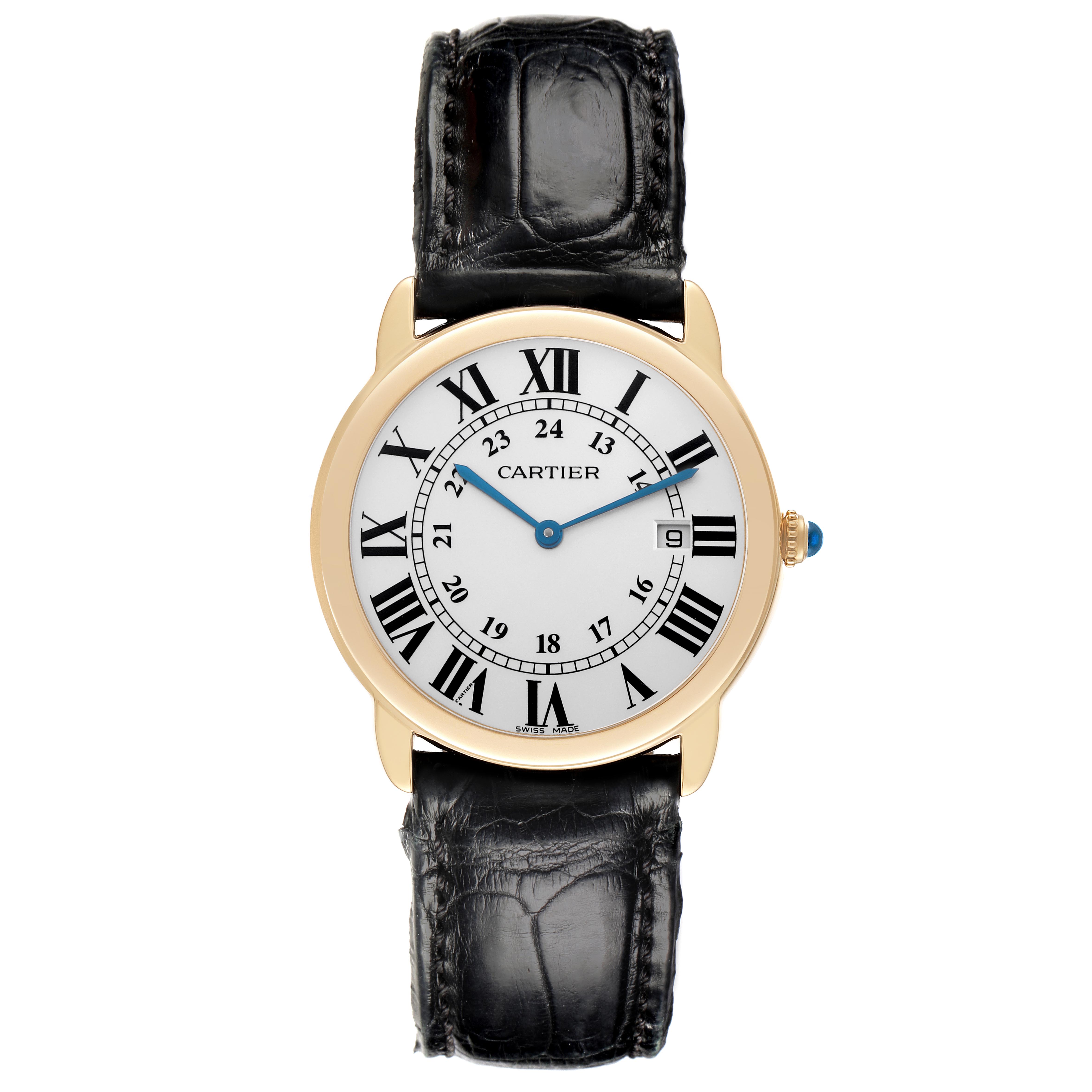 The Cartier Ronde W6700455 Men
s Yellow Gold Silver Dial W6700455 Men
s Yellow Gold Silver Dial model watch is shown from a top-down angle, displaying the face, Roman numerals, hands, and leather strap.