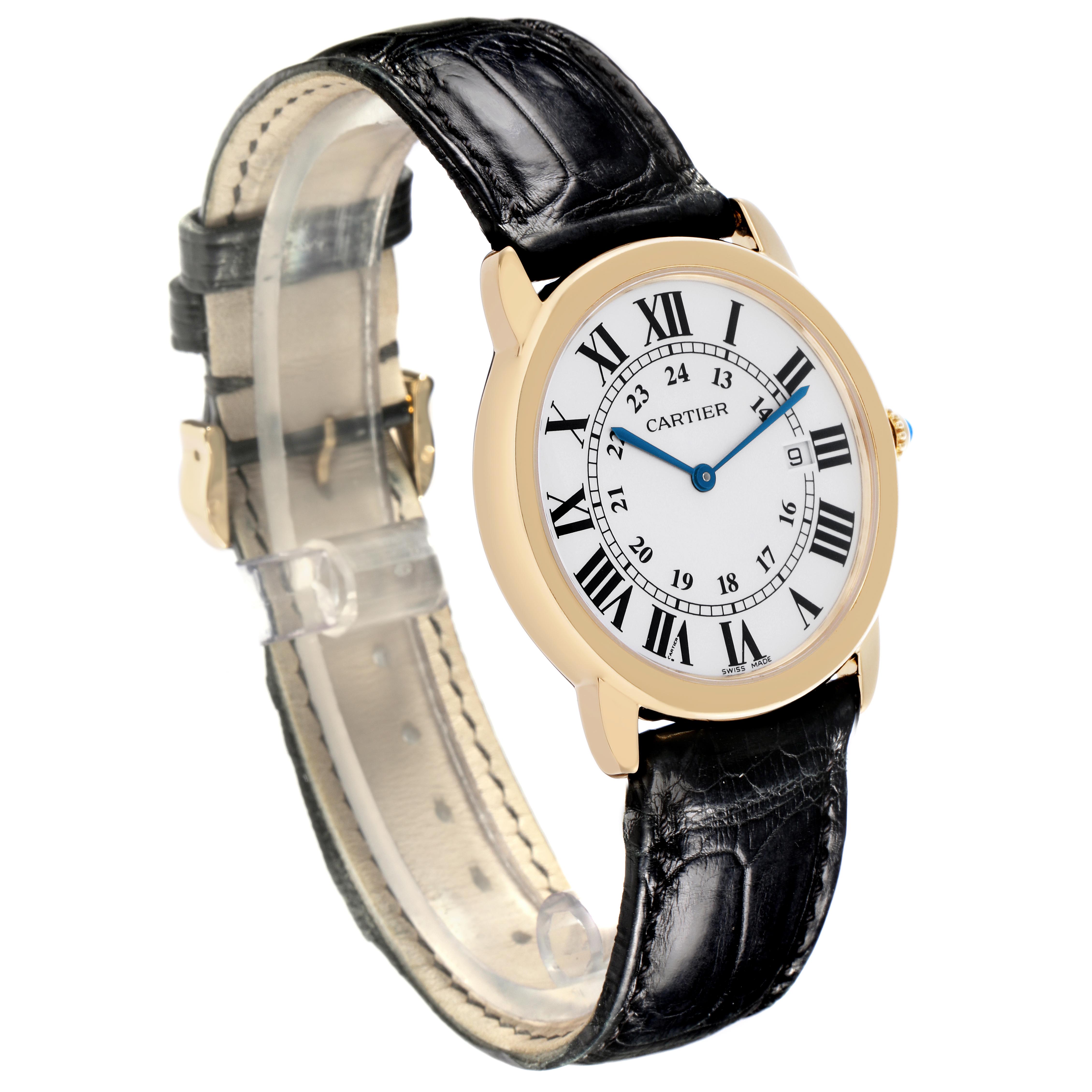 The Cartier Ronde W6700455 Men
s Yellow Gold Silver Dial W6700455 Men
s Yellow Gold Silver Dial watch is shown at a slight angle, displaying the face, strap, and gold case.
