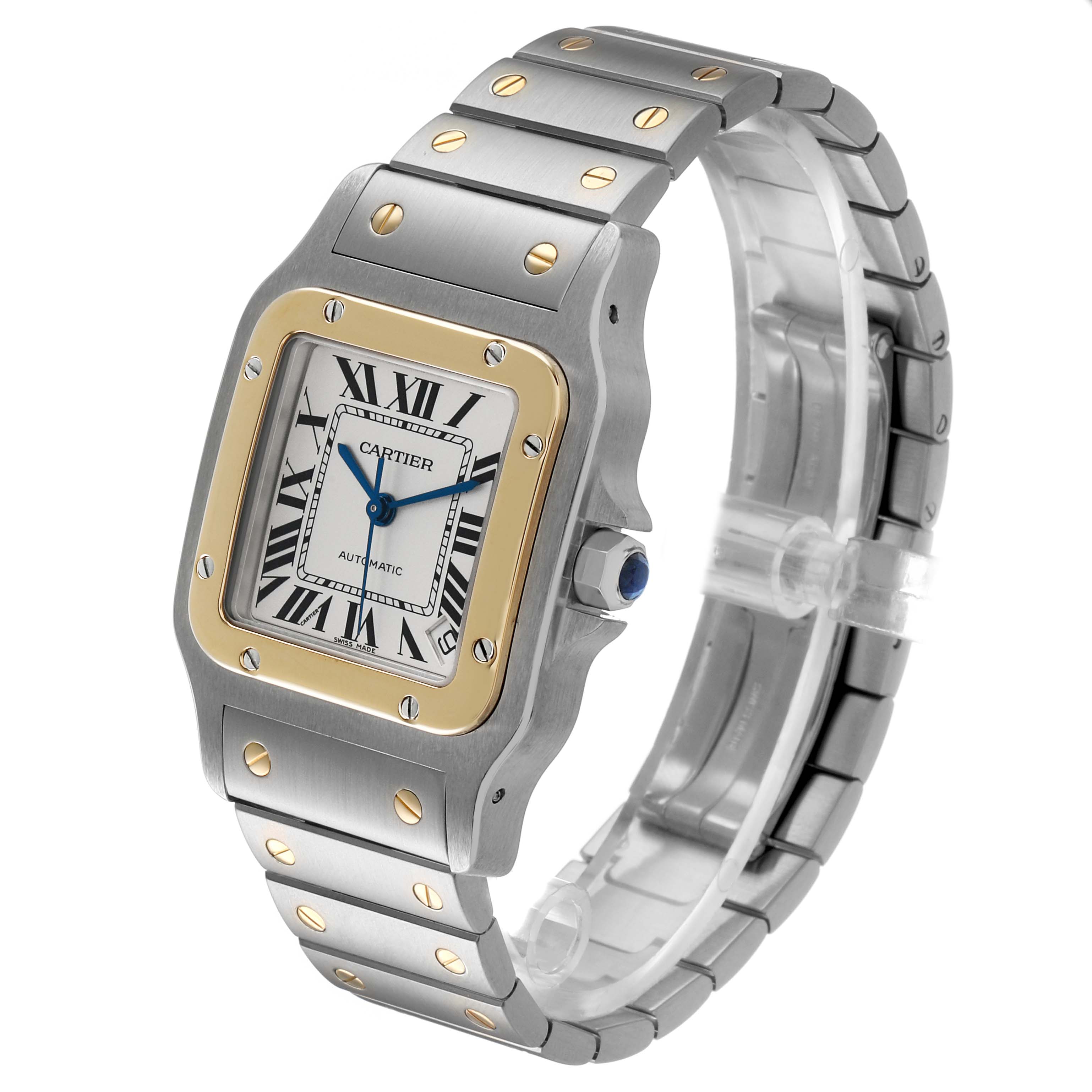 The Cartier Santos W20099C4 Men's Steel and Gold (two tone) Silver Dial watch is shown at a three-quarter angle, highlighting its square face, gold bezel, and metal bracelet with screws.