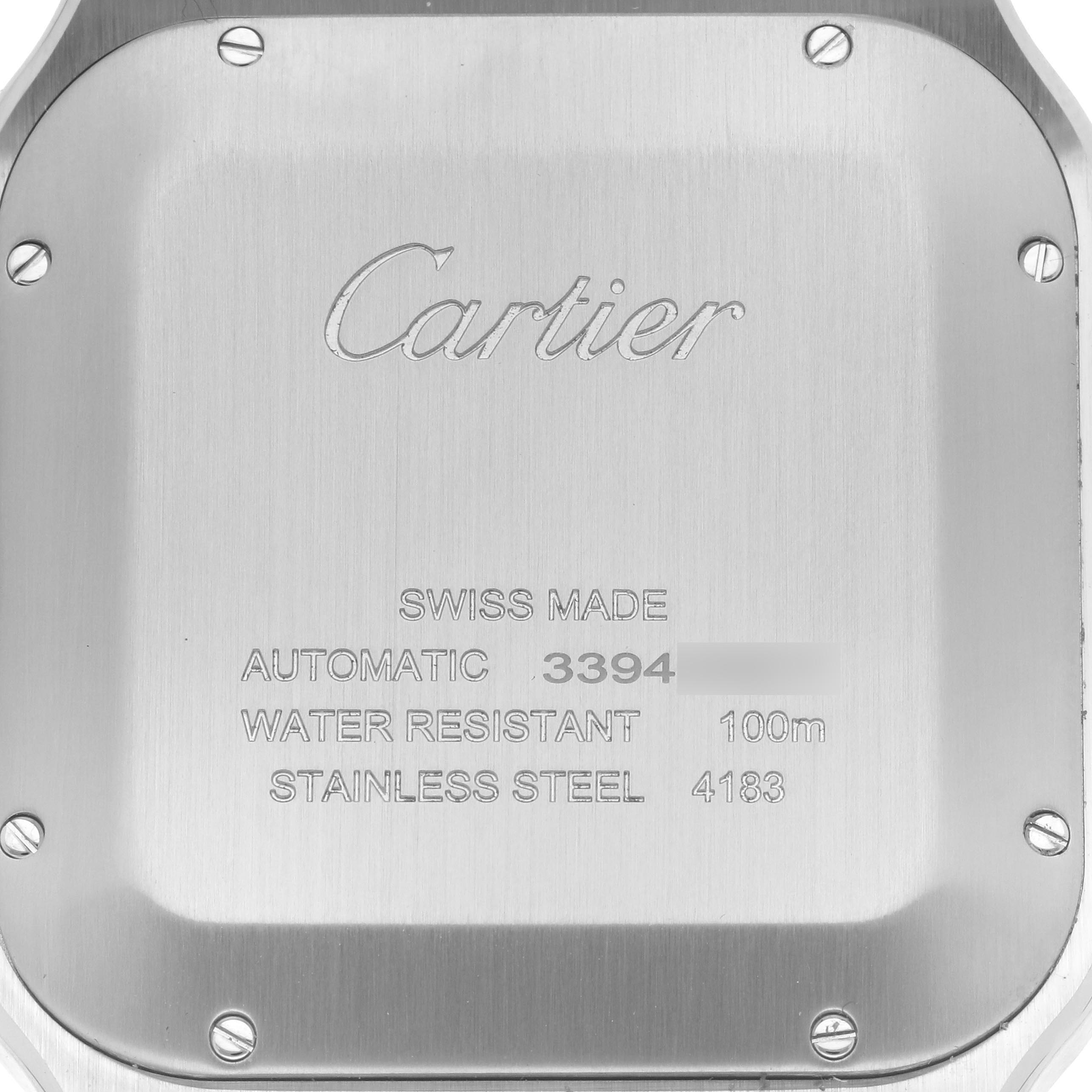 The image shows the back casing of a Cartier Santos WSSA0078 Men's Stainless Steel Grey Dial WSSA0078 Men's Stainless Steel Grey Dial watch, displaying text and screws.