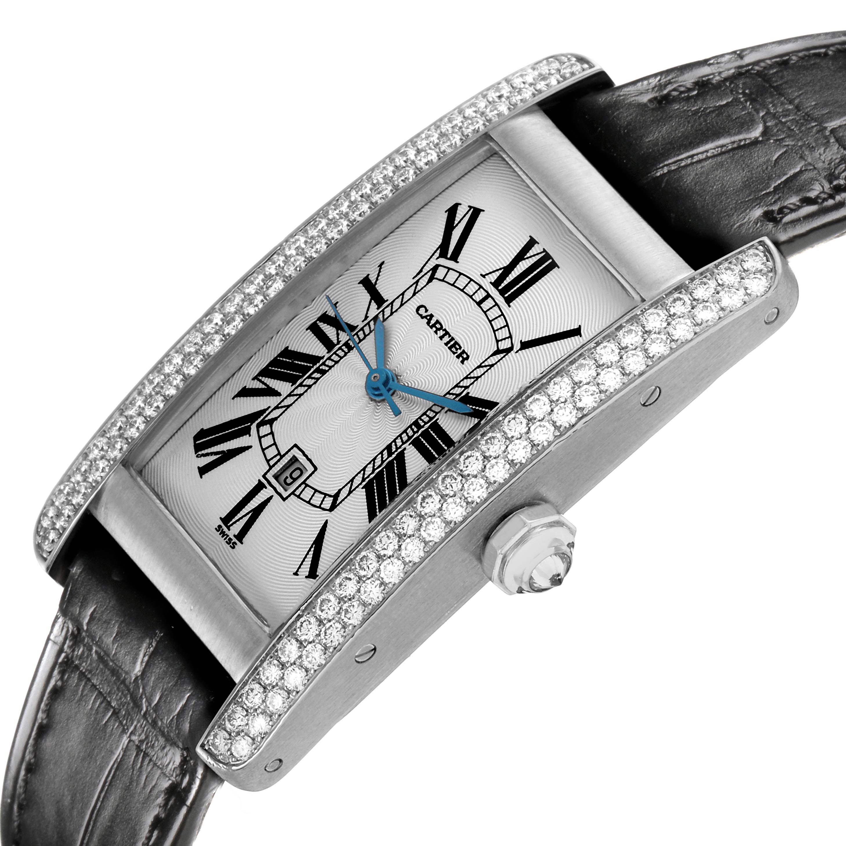 The Cartier Tank Americaine WB702651 Women's White Gold Silver Dial WB702651 Women's White Gold Silver Dial watch is shown at an angled view, highlighting its face, diamond-encrusted case, and crown.
