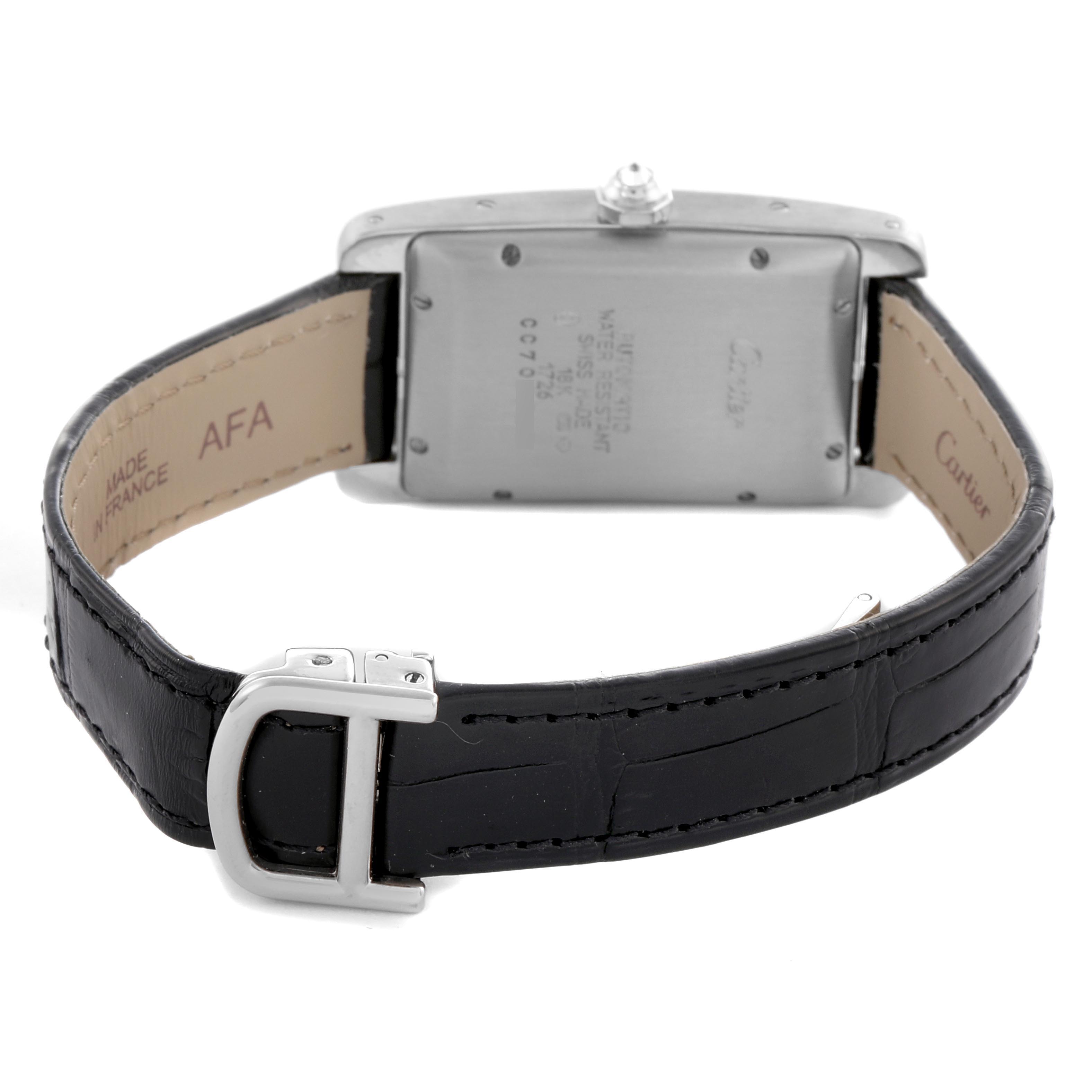 The image shows the back of a Cartier Tank Americaine WB702651 Women's White Gold Silver Dial WB702651 Women's White Gold Silver Dial watch, highlighting the clasp and black leather strap.