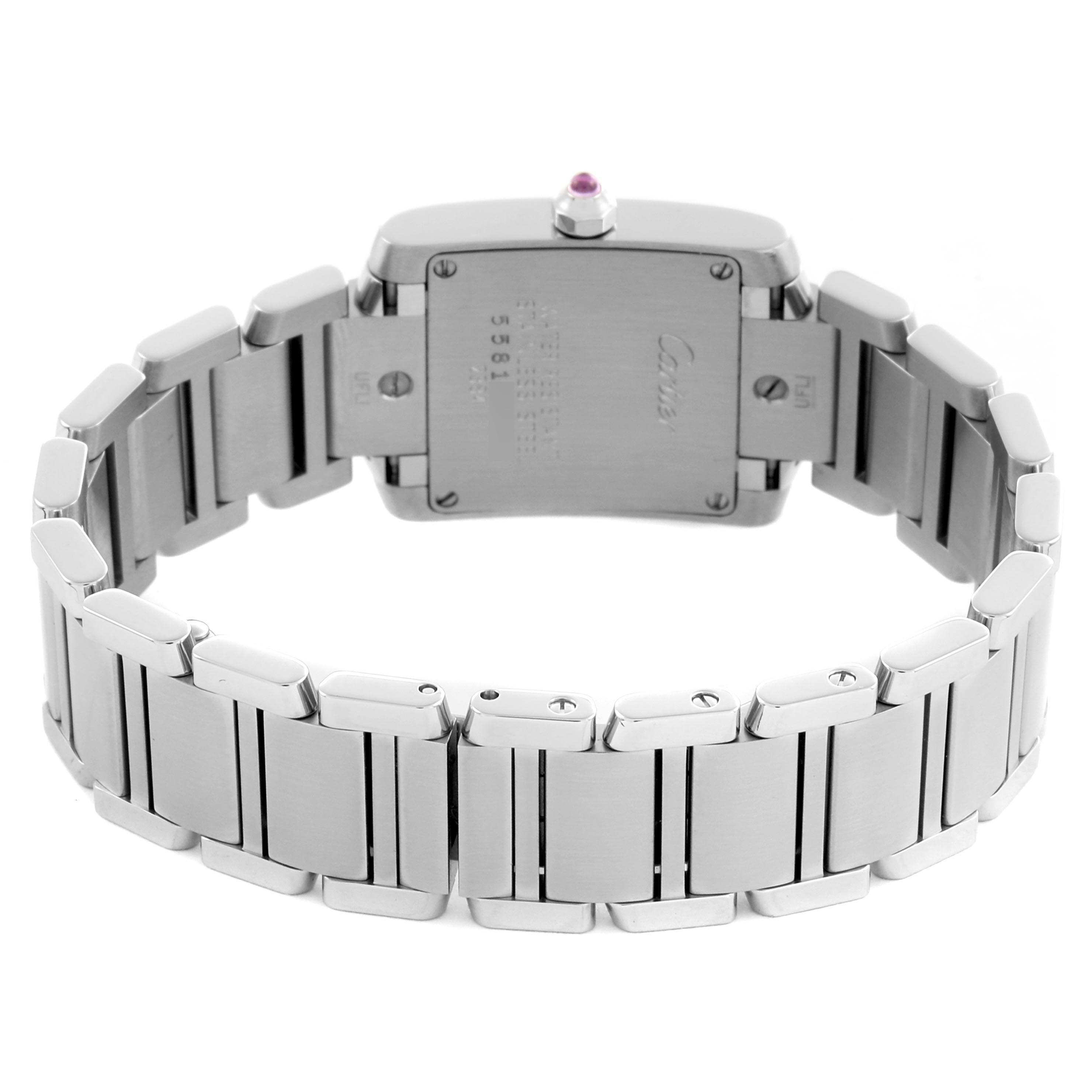 The image shows the back view of a Cartier Tank Française watch, highlighting the bracelet and clasp details.