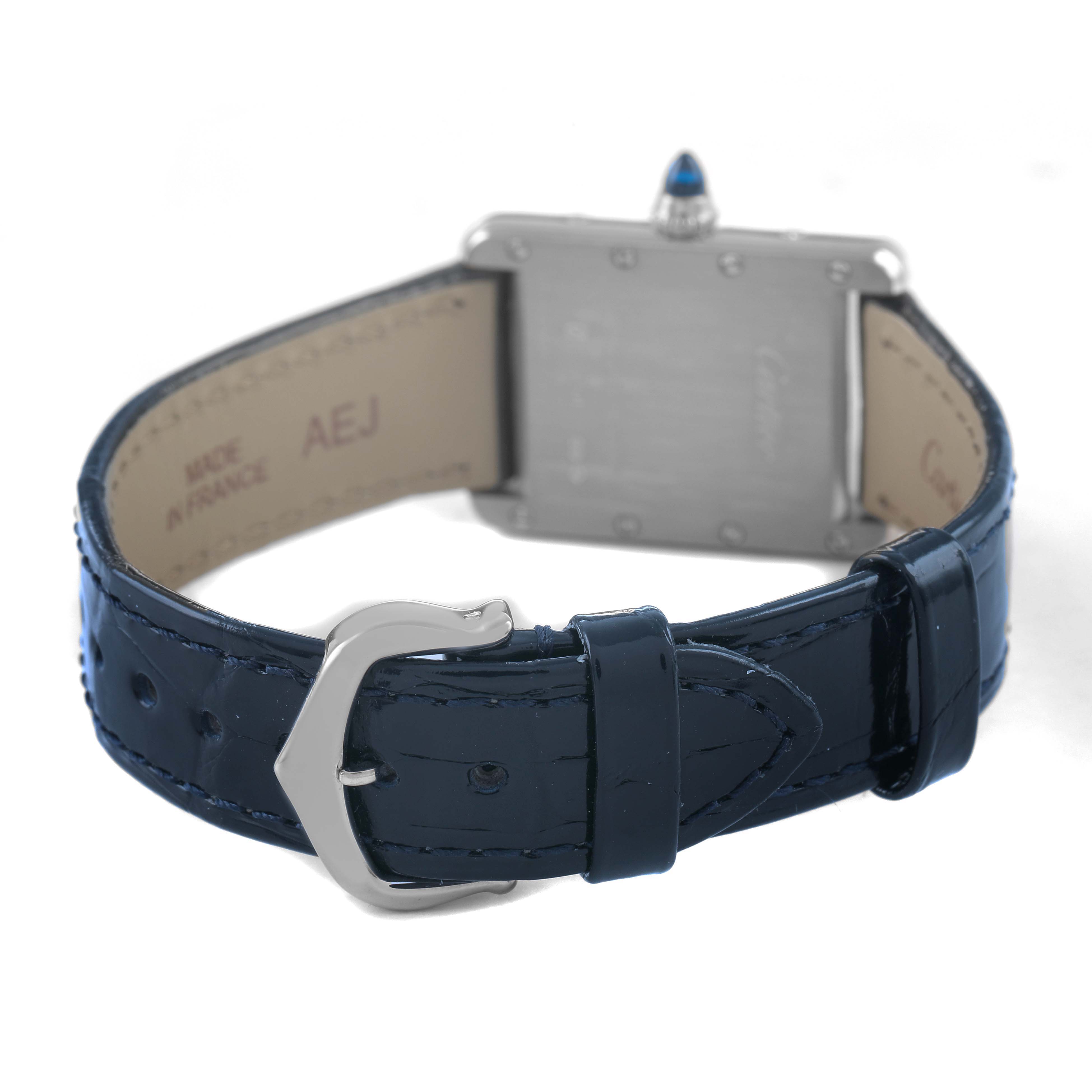 The image shows the back of a Cartier Tank Louis W1541056 Women's White Gold Silver Dial watch, focusing on the strap and buckle.