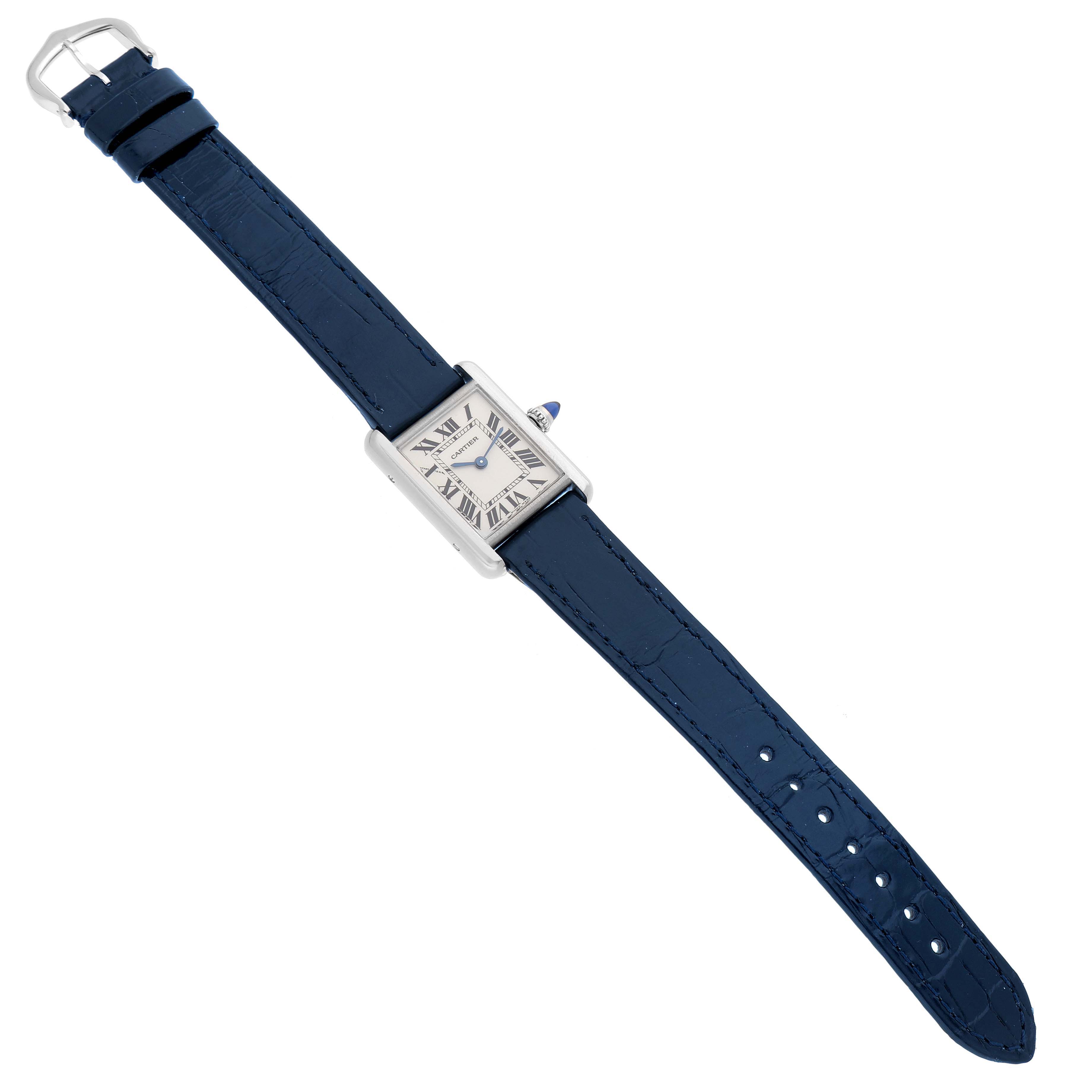 The Cartier Tank Louis W1541056 Women's White Gold Silver Dial watch is shown from a top-down angle, displaying the face, blue strap, and side crown.