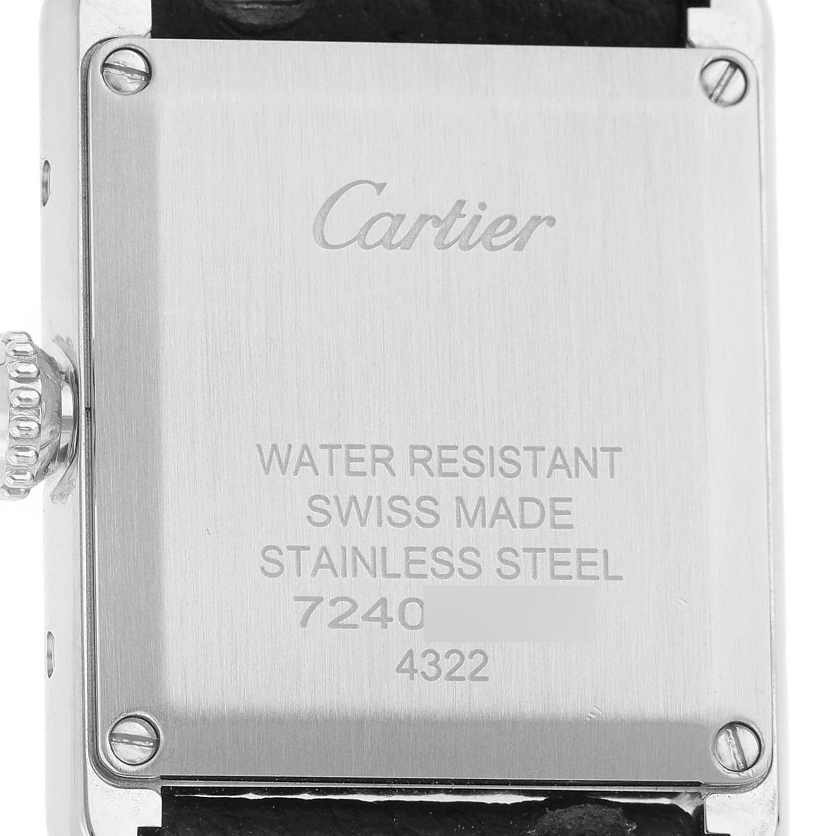 The image shows the back of a Cartier Tank Must WSTA0042 Men's Stainless Steel Silver Dial watch, highlighting its stainless steel case and branding details.