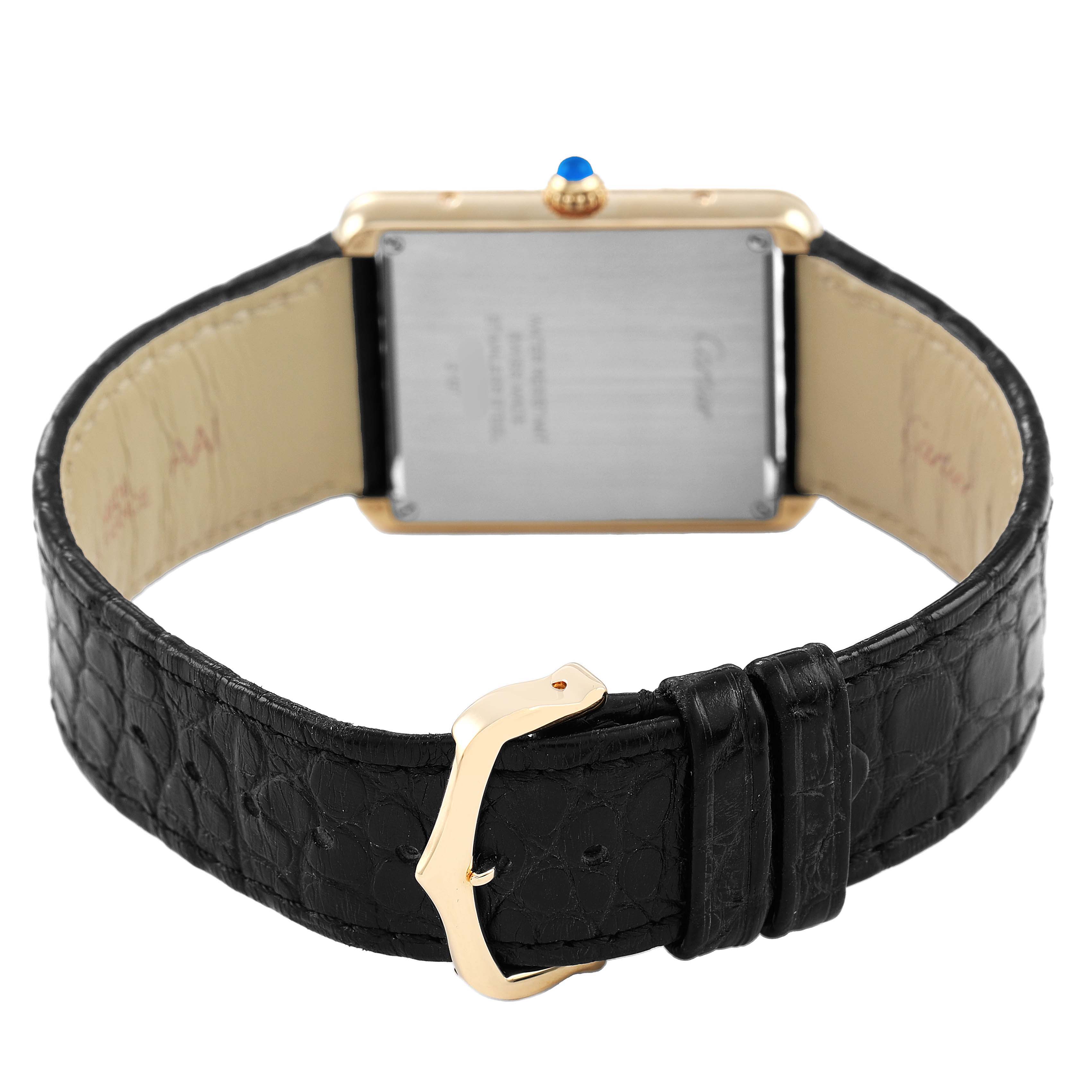 The image shows the back of the Cartier Tank Solo W5200004 Men's Yellow Gold Silver Dial watch, highlighting the strap, buckle, and case back.