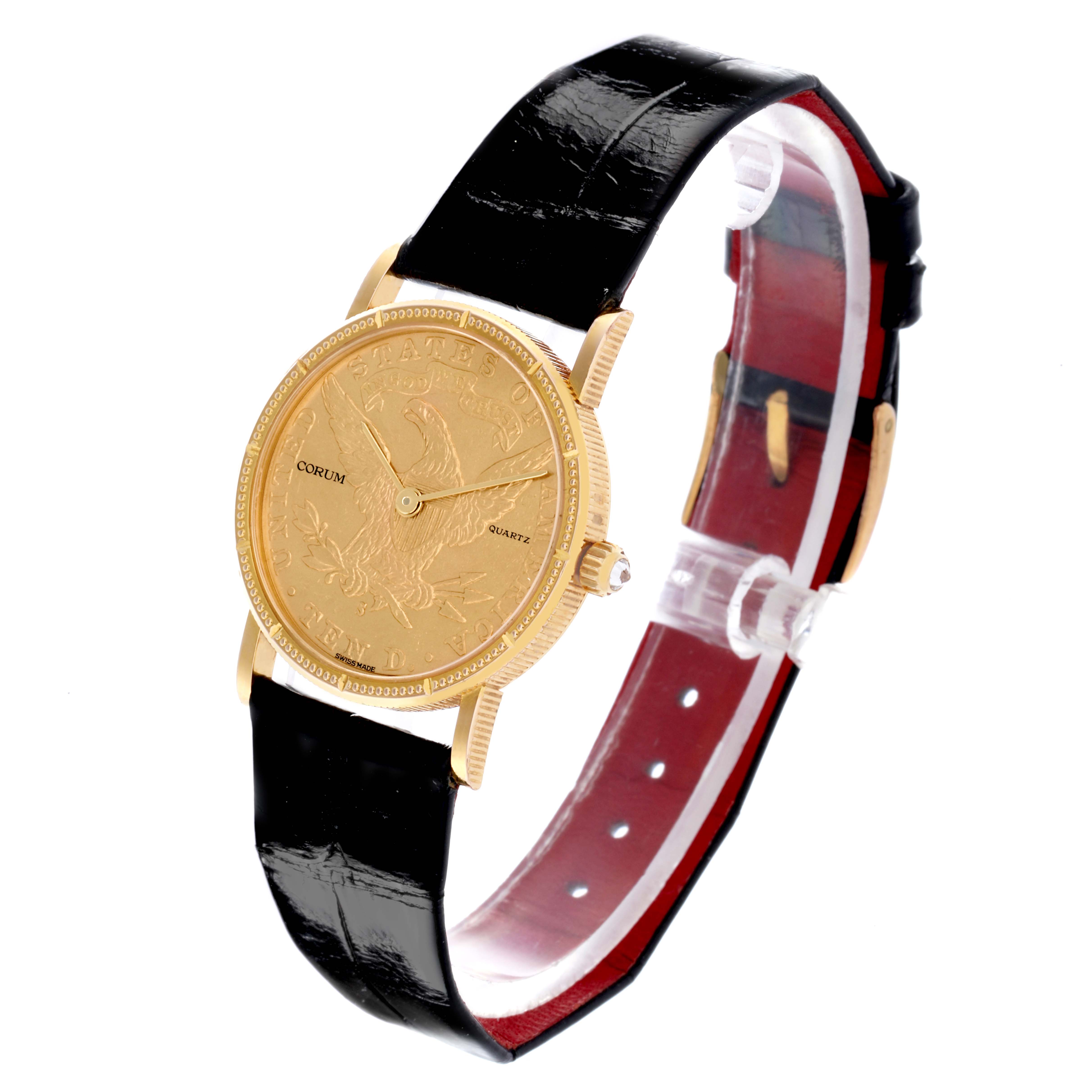 The Corum 5014856 V41 Women's Yellow Gold Champagne Dial 5014856 V41 Women's Yellow Gold Champagne Dial Coin 10 Dollars Double Eagle Yellow Gold Ladies Watch 1892 is shown at a slight angle, highlighting its gold case, black strap, and coin-face dial.