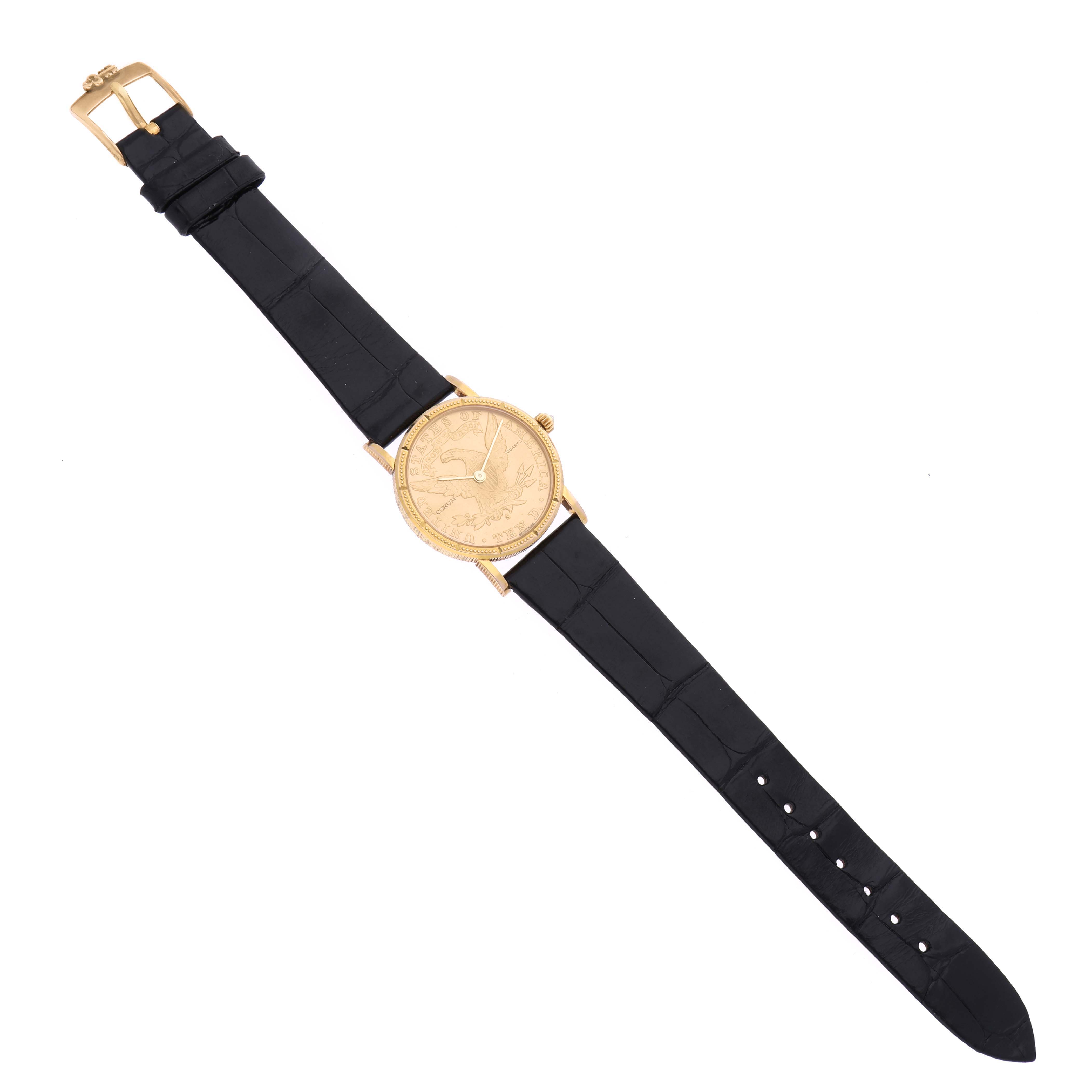 The Corum 5014856 V41 Women's Yellow Gold Champagne Dial 5014856 V41 Women's Yellow Gold Champagne Dial Coin 10 Dollars Double Eagle Yellow Gold Ladies Watch 1892 is shown from a top-down angle, displaying the entire watch and strap.