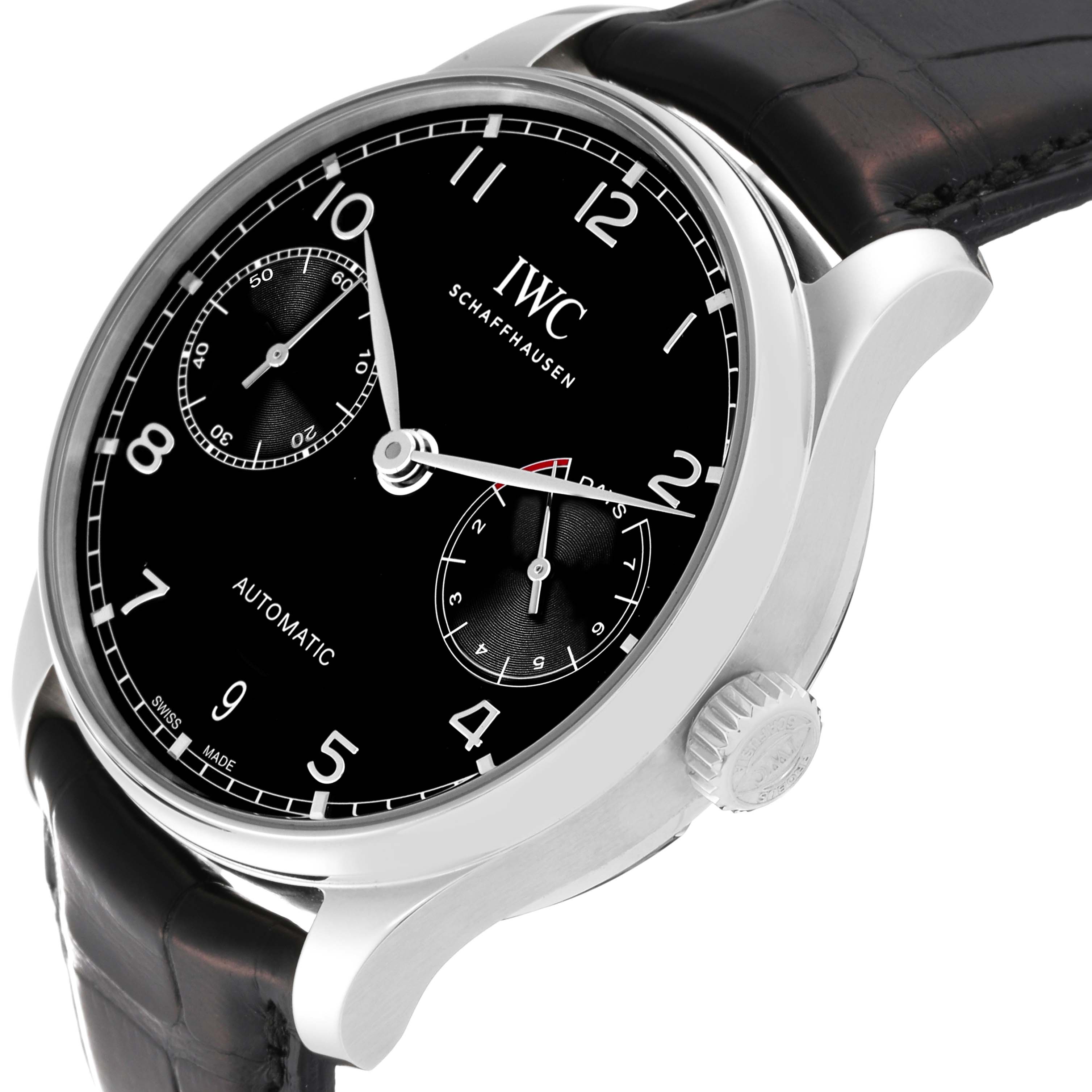 This image showcases an angled side view of the IWC Portuguese IW500703 Men's Stainless Steel Black Dial IW500703 Men's Stainless Steel Black Dial model, highlighting the dial, crown, and part of the leather strap.