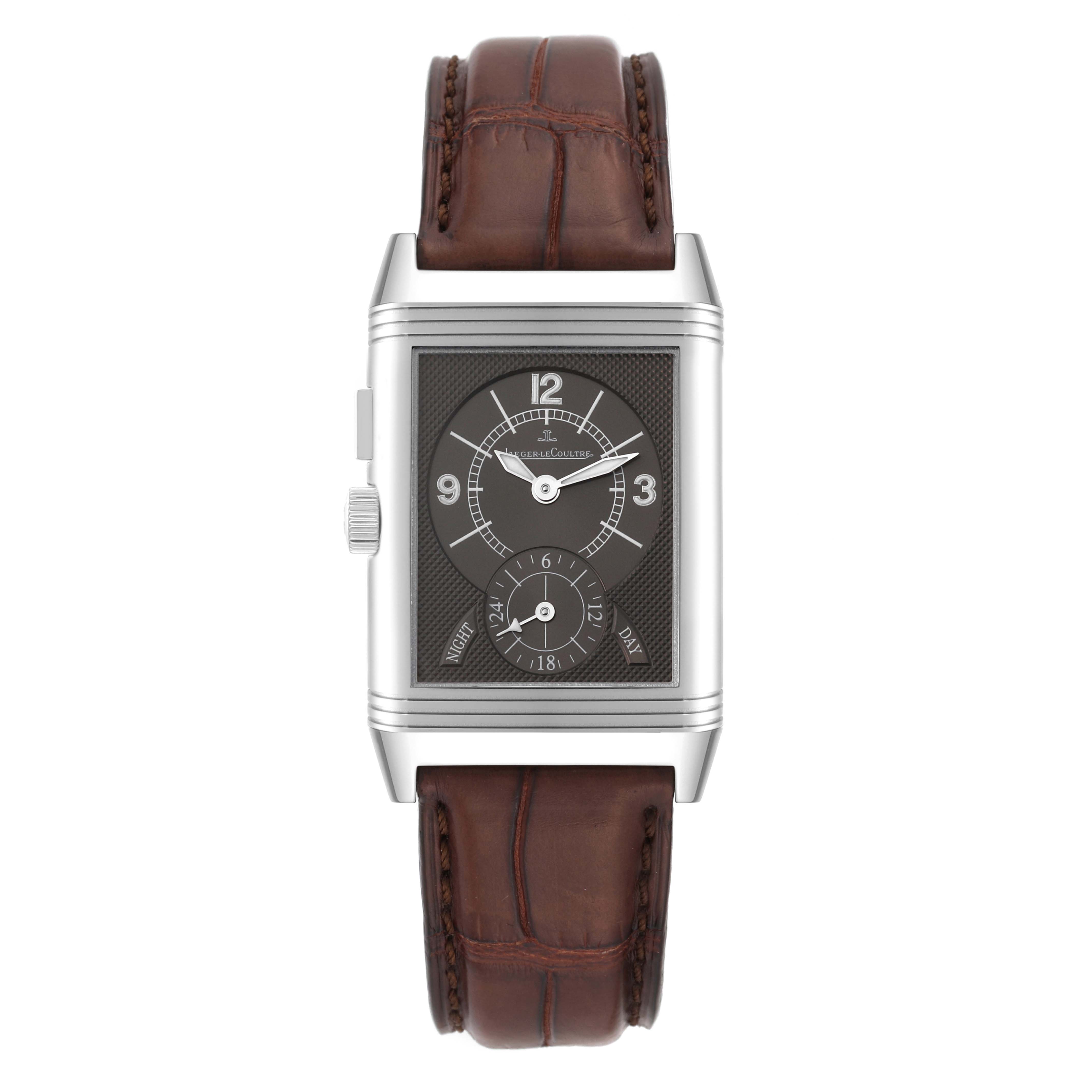 The image shows a front view of a Jaeger LeCoultre Reverso Q2718410 Men
s Stainless Steel Silver Dial Q2718410 Men
s Stainless Steel Silver Dial watch with a brown leather strap and detailed dial.