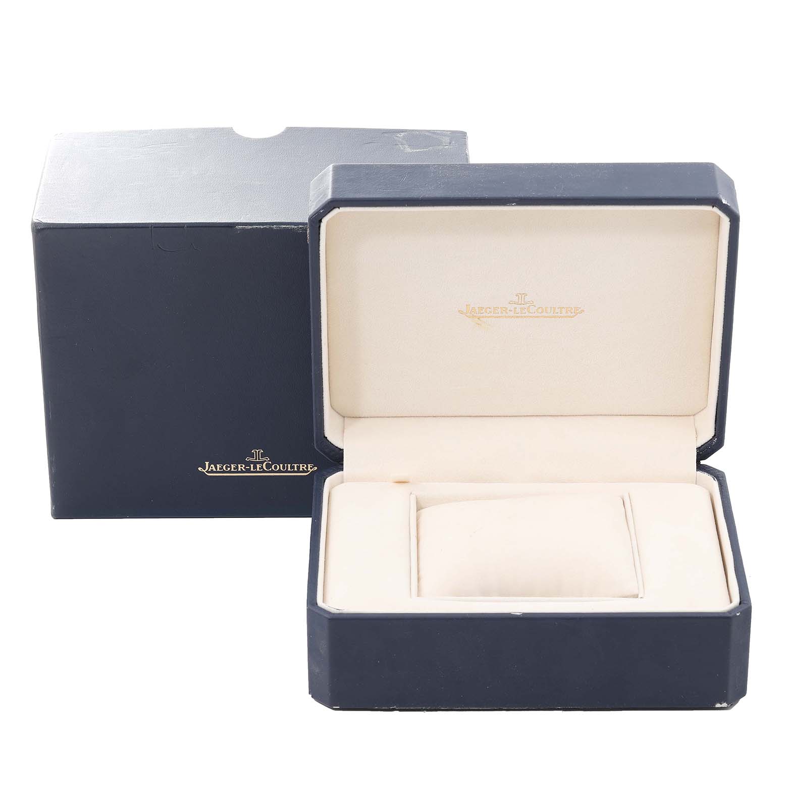 This image shows the watch box and inner cushion of a Jaeger LeCoultre Reverso Q3001420 Men's Yellow Gold Silver Dial Q3001420 Men's Yellow Gold Silver Dial model from a front angle.