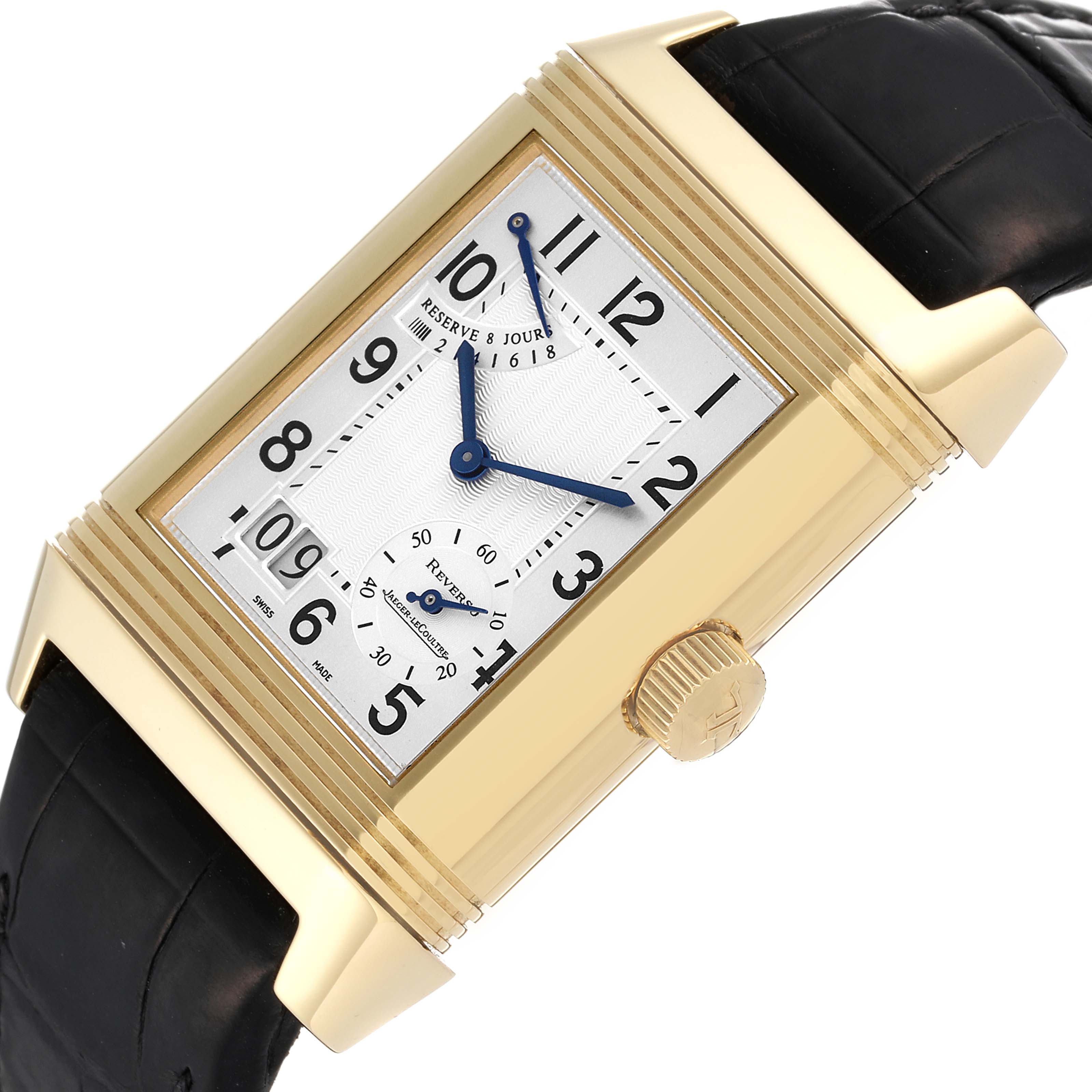 This image shows a Jaeger LeCoultre Reverso Q3001420 Men's Yellow Gold Silver Dial Q3001420 Men's Yellow Gold Silver Dial watch at a slight angle, focusing on the rectangular face, crown, and leather strap.