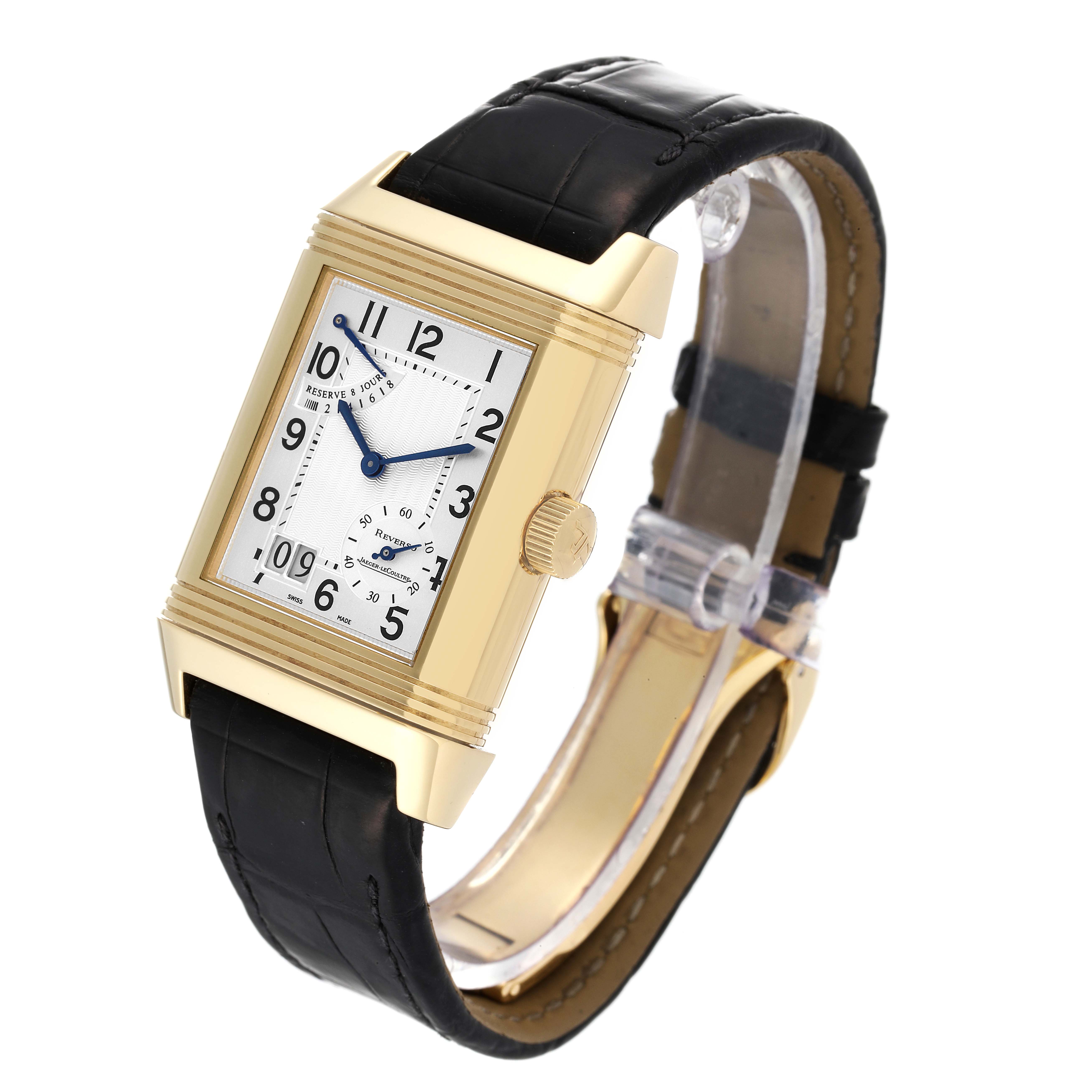 The Jaeger LeCoultre Reverso Q3001420 Men's Yellow Gold Silver Dial Q3001420 Men's Yellow Gold Silver Dial watch is shown at a three-quarter angle, highlighting the dial, crown, and black leather strap.