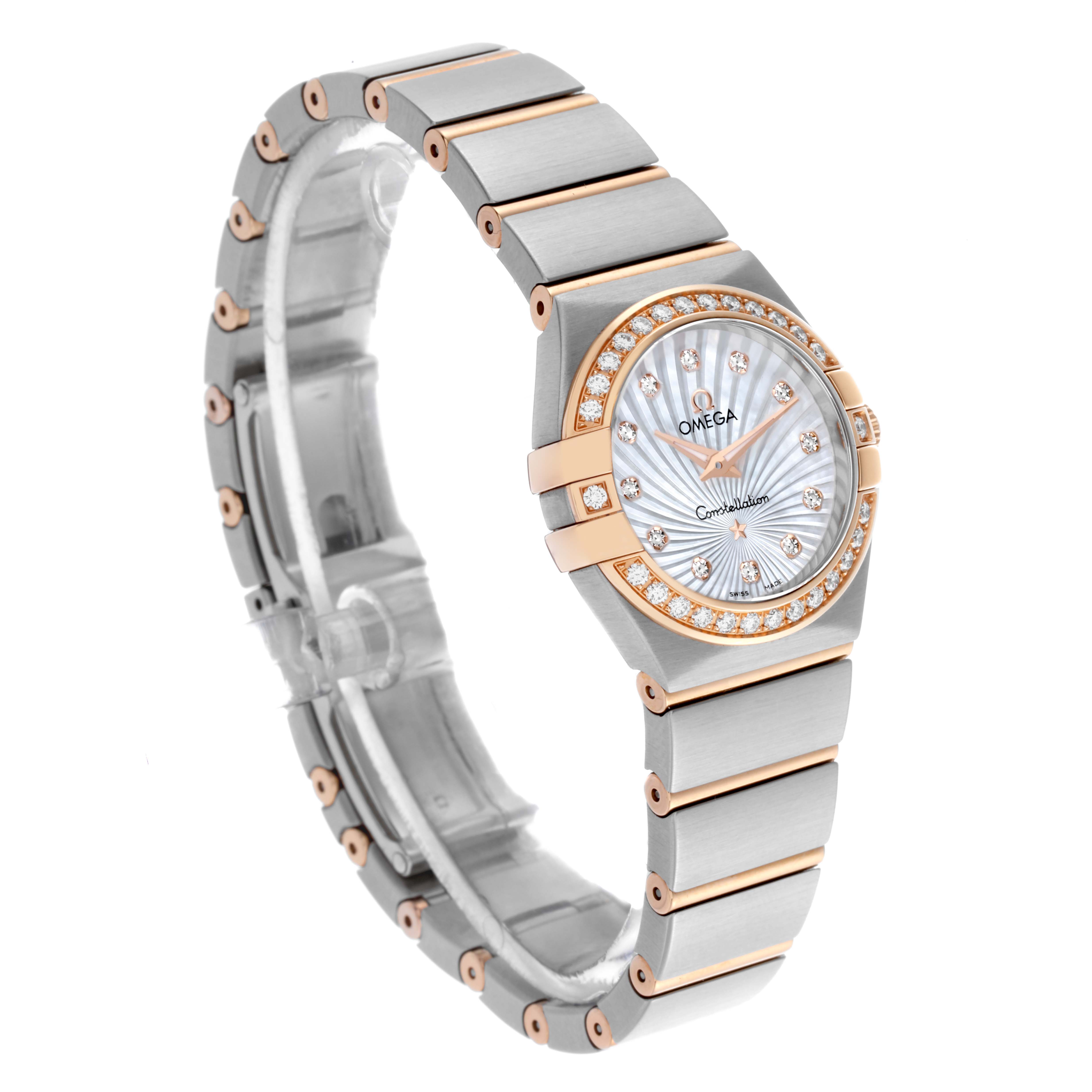 The Omega 123.25.24.60.55.002 Women's Steel and Gold (two tone) Mother of Pearl Dial 123.25.24.60.55.002 Women's Steel and Gold (two tone) Mother of Pearl Dial Constellation Steel Rose Gold Diamond Watch is shown at a three-quarter angle, highlighting its bracelet, bezel, and dial.