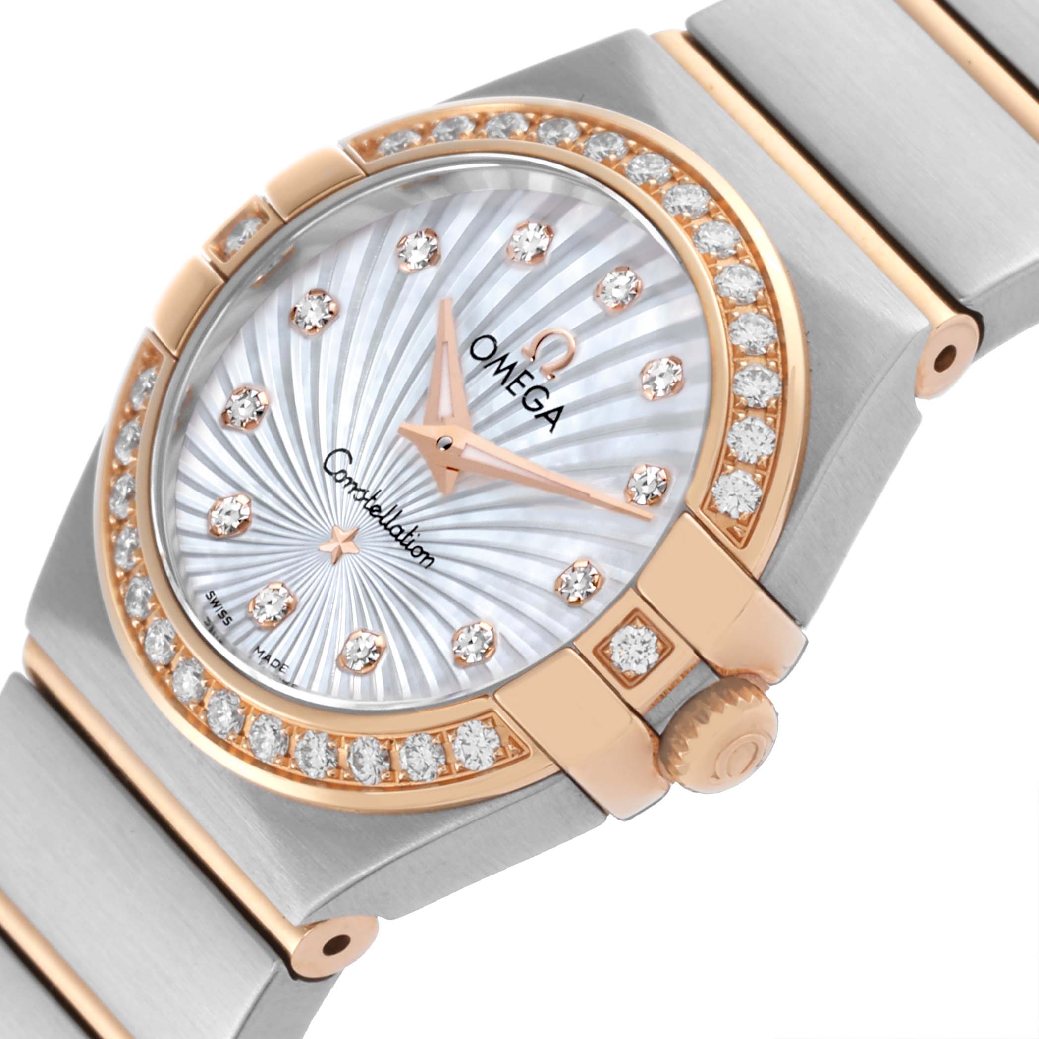 The Omega 123.25.24.60.55.002 Women's Steel and Gold (two tone) Mother of Pearl Dial 123.25.24.60.55.002 Women's Steel and Gold (two tone) Mother of Pearl Dial Constellation Steel Rose Gold Diamond Watch is shown from an angled close-up, displaying the dial, bezel, and part of the bracelet.