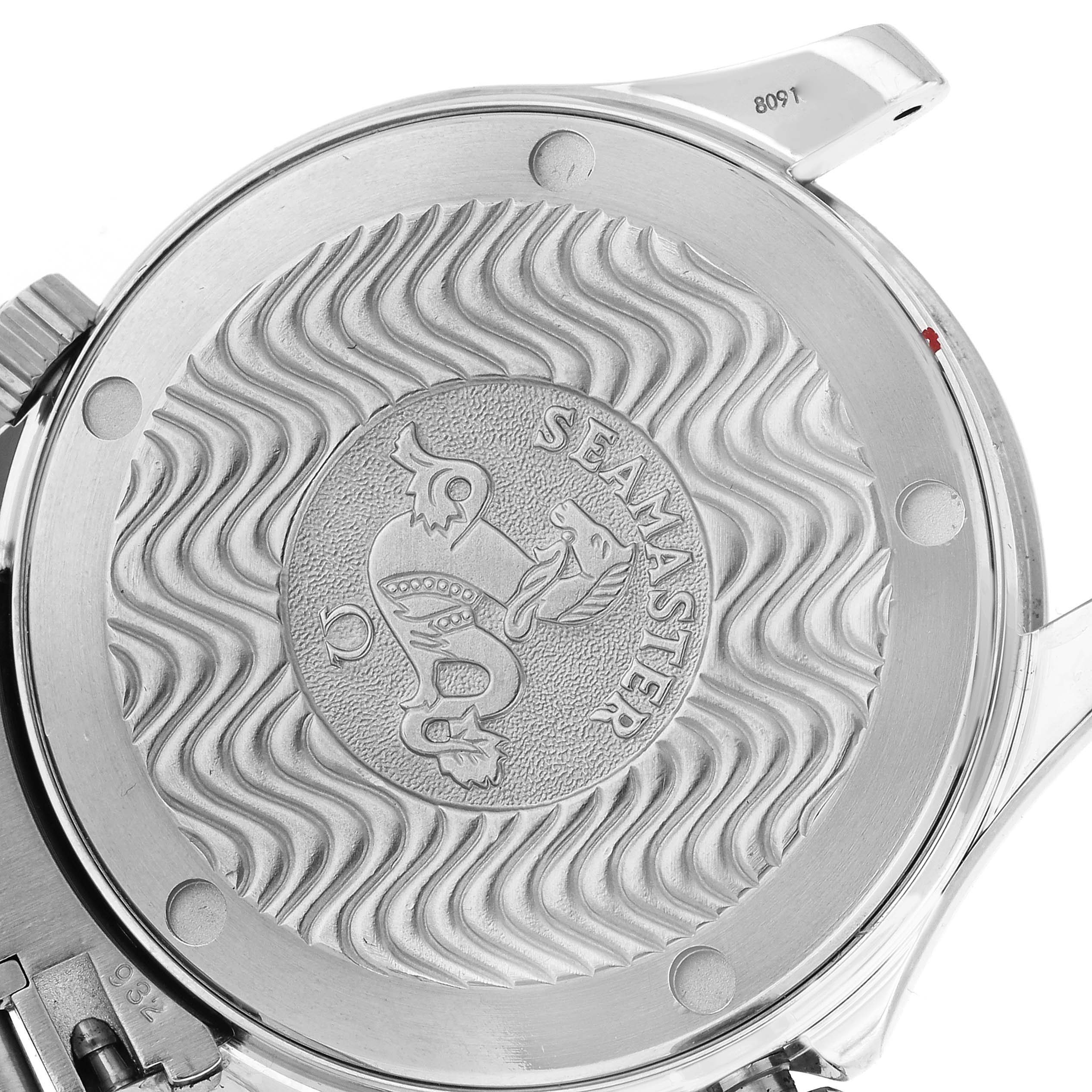 The image shows the back of an Omega Seamaster 2252.50.00 Men
s Stainless Steel Black Dial 2252.50.00 Men
s Stainless Steel Black Dial watch, highlighting the engraved wave pattern and logo.