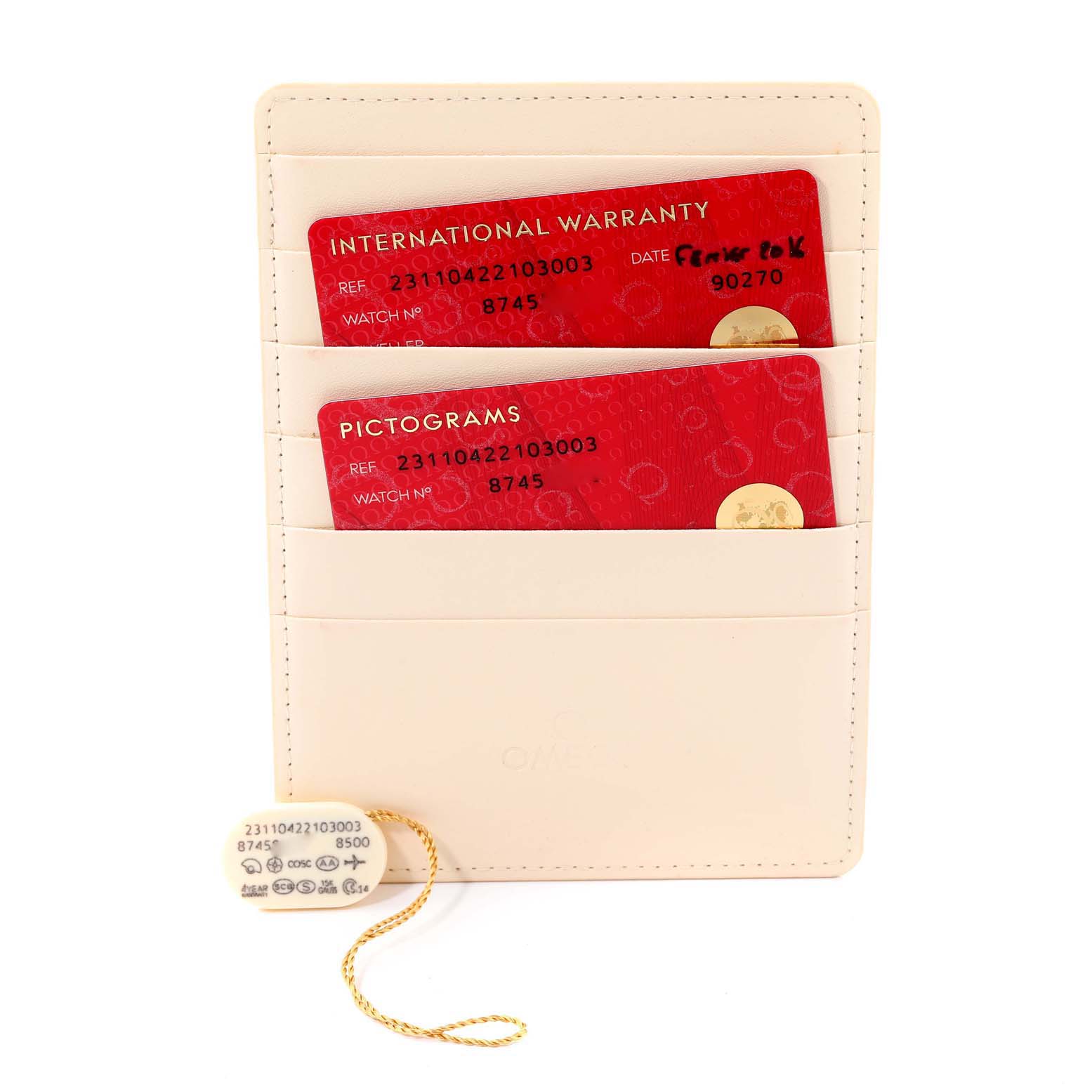 The image shows a warranty card holder with International Warranty and Pictograms cards for an Omega Seamaster 231.10.42.21.03.003 Men's Stainless Steel Blue Dial 231.10.42.21.03.003 Men's Stainless Steel Blue Dial watch.