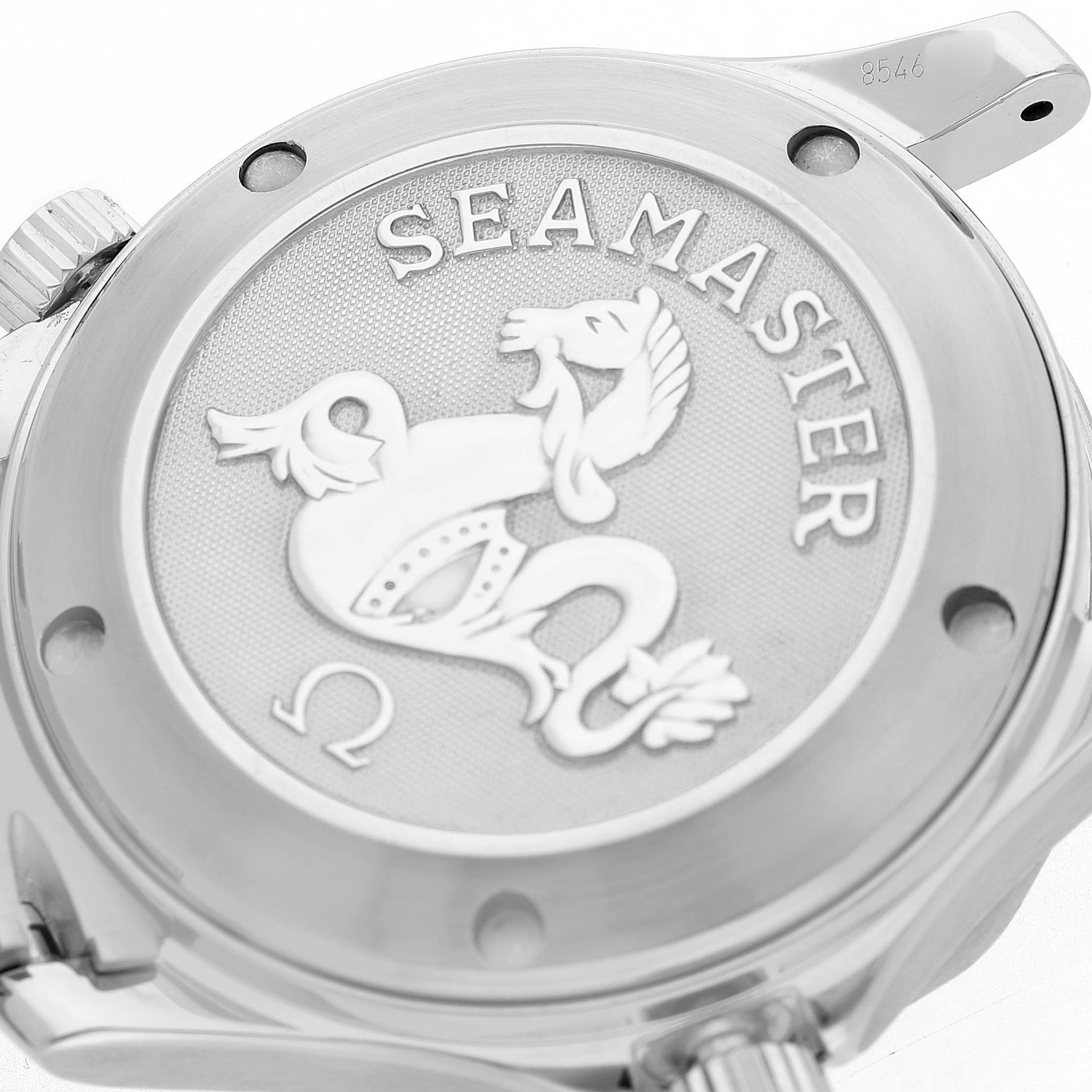 The image shows the case back of an Omega Seamaster 2222.80.00 Men's Stainless Steel Blue Dial watch, featuring its engraved emblem and parts of the lugs.