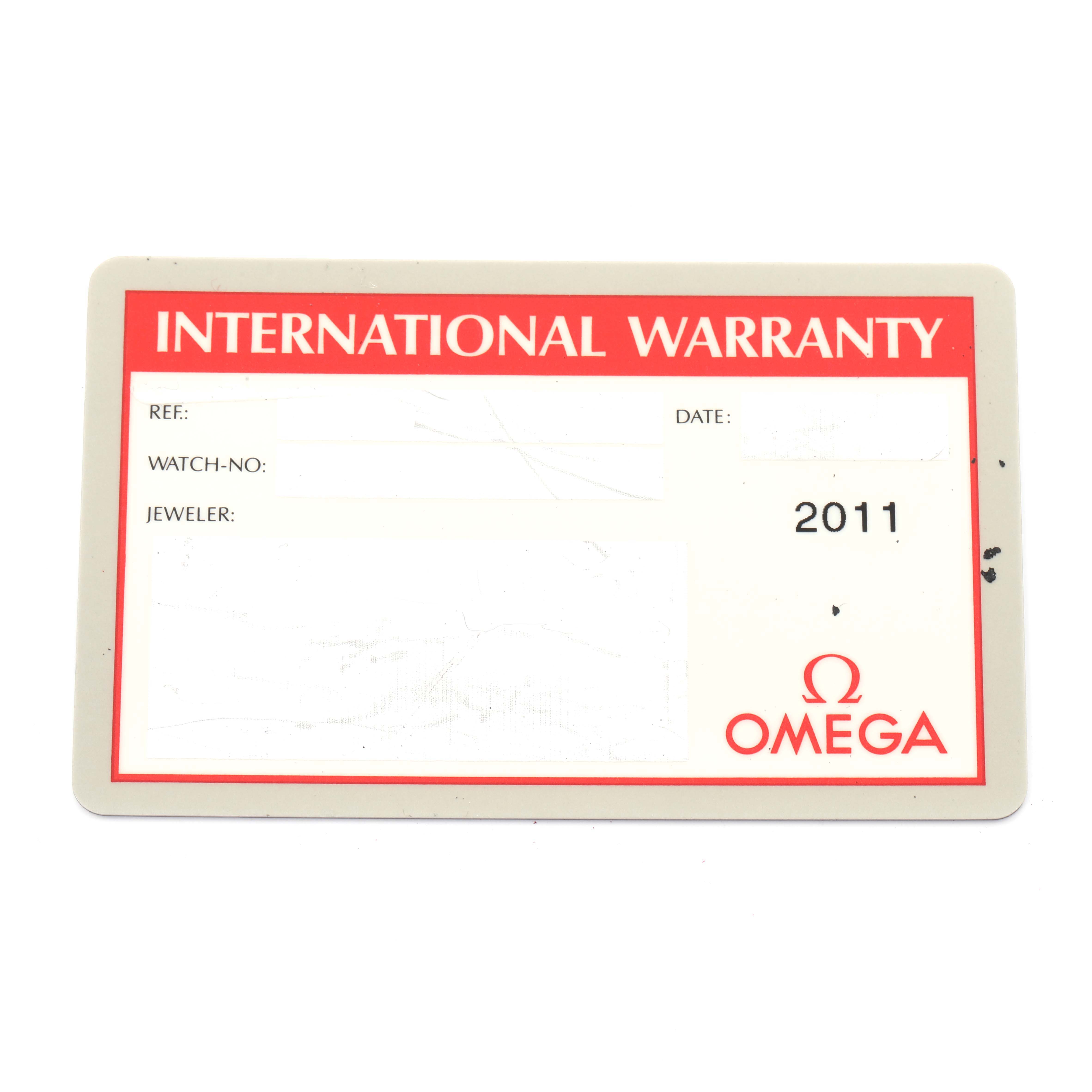 The image shows the International Warranty card for an Omega Seamaster 2551.80.00 Men
s Stainless Steel Blue Dial 2551.80.00 Men
s Stainless Steel Blue Dial watch, displaying fields for reference, date, watch number, and jeweler.