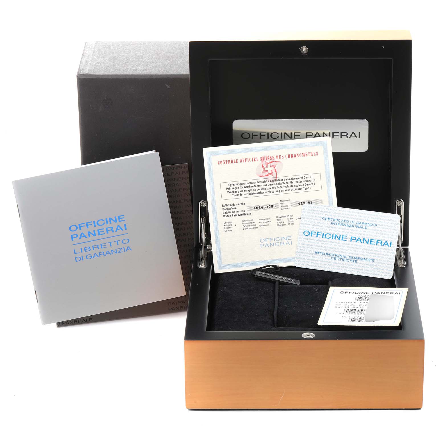 The image shows the packaging and accessories of a Panerai Luminor PAM00119 Men's Stainless Steel Blue Dial PAM00119 Men's Stainless Steel Blue Dial watch, including a warranty card, manual, and box.