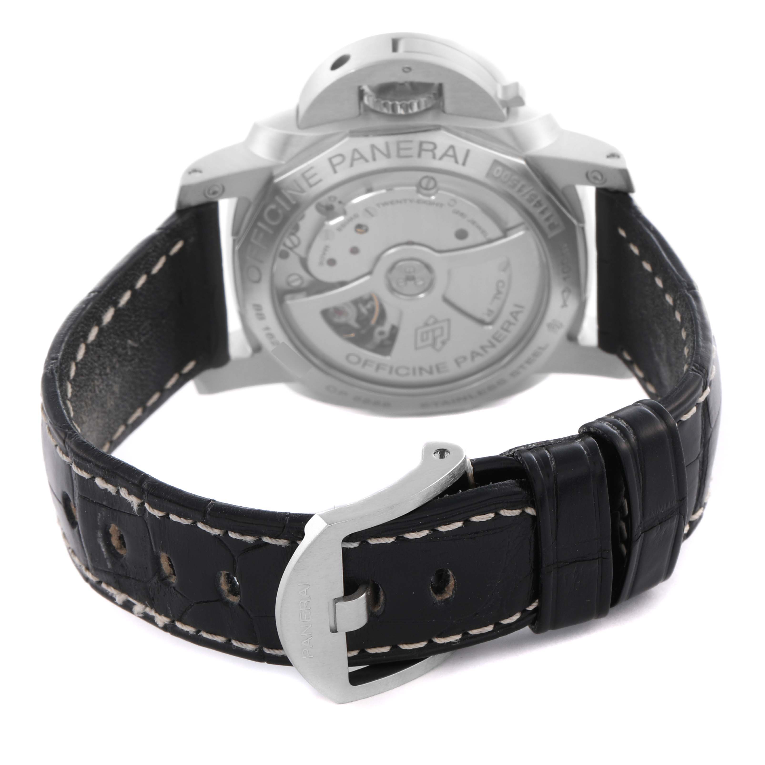 The Panerai Luminor PAM00392 Men's Stainless Steel Black Dial PAM00392 Men's Stainless Steel Black Dial watch is shown from the back, displaying the case back, movement, and black leather strap with clasp.