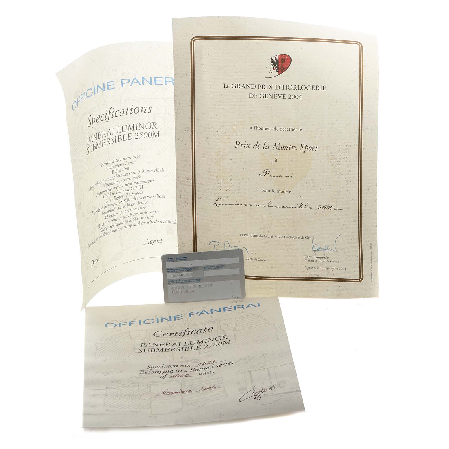 The image displays official documents and a certificate for the Panerai Luminor Submersible model, not the watch itself.