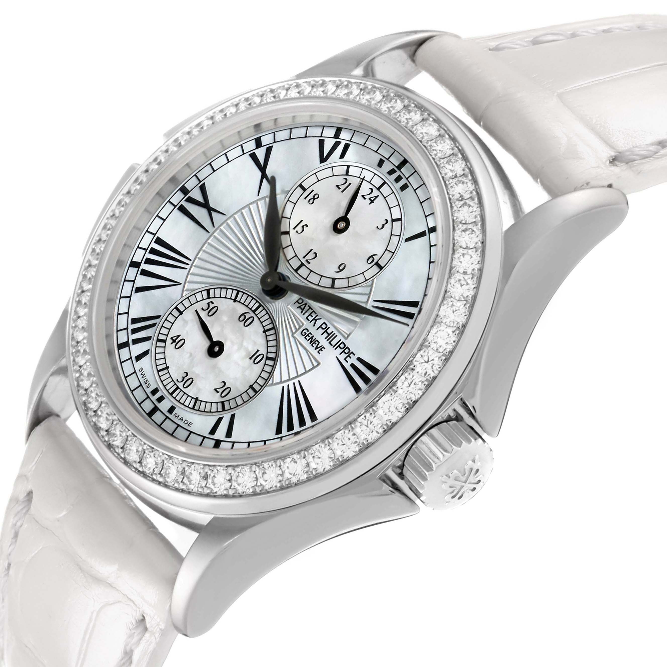 The Patek Philippe Calatrava 4934G-001 Women's White Gold Mother of Pearl Dial watch is shown at a slight side angle, highlighting the dial, bezel, crown, and part of the strap.