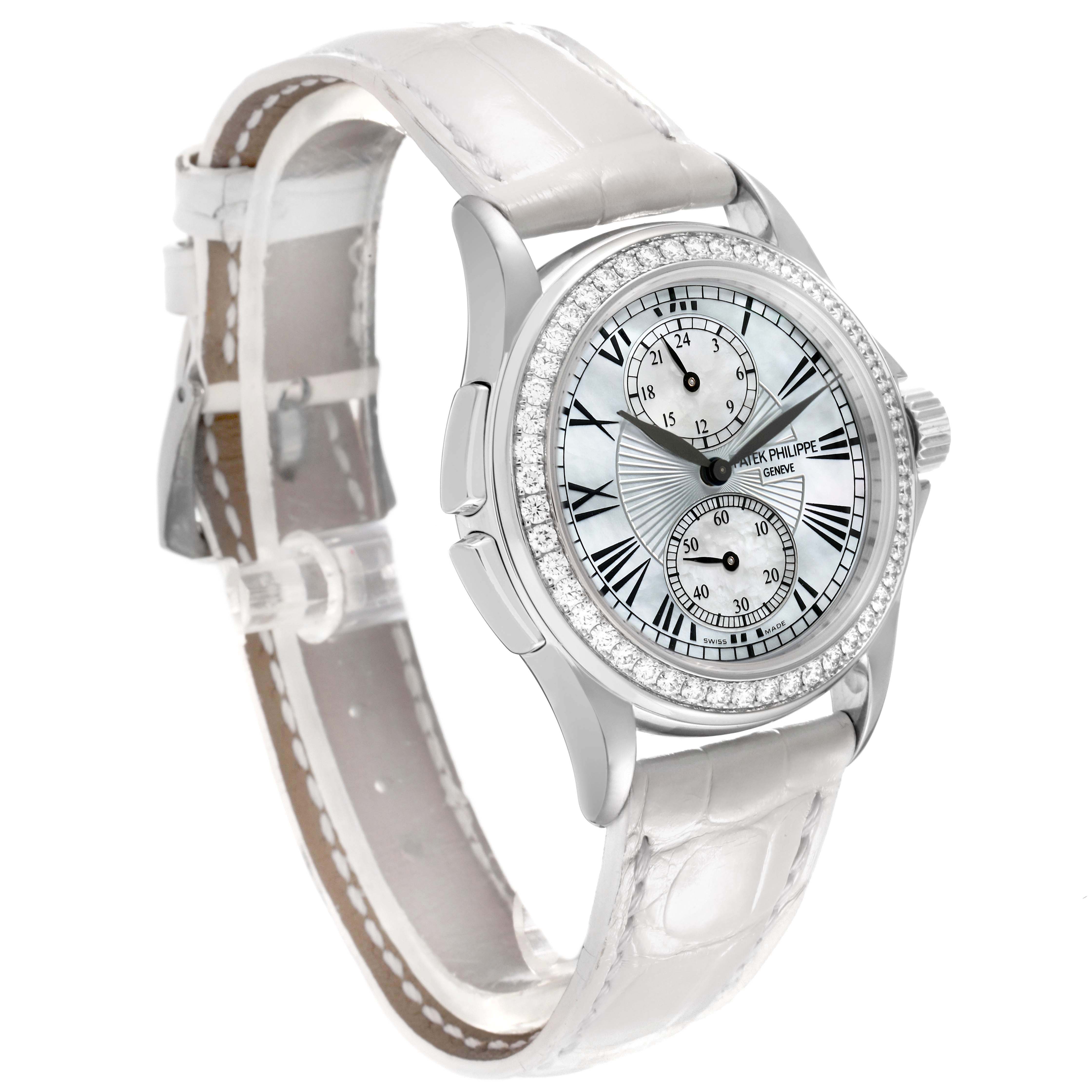 The Patek Philippe Calatrava 4934G-001 Women's White Gold Mother of Pearl Dial watch is shown at a three-quarter angle, highlighting its face, bezel, and strap.
