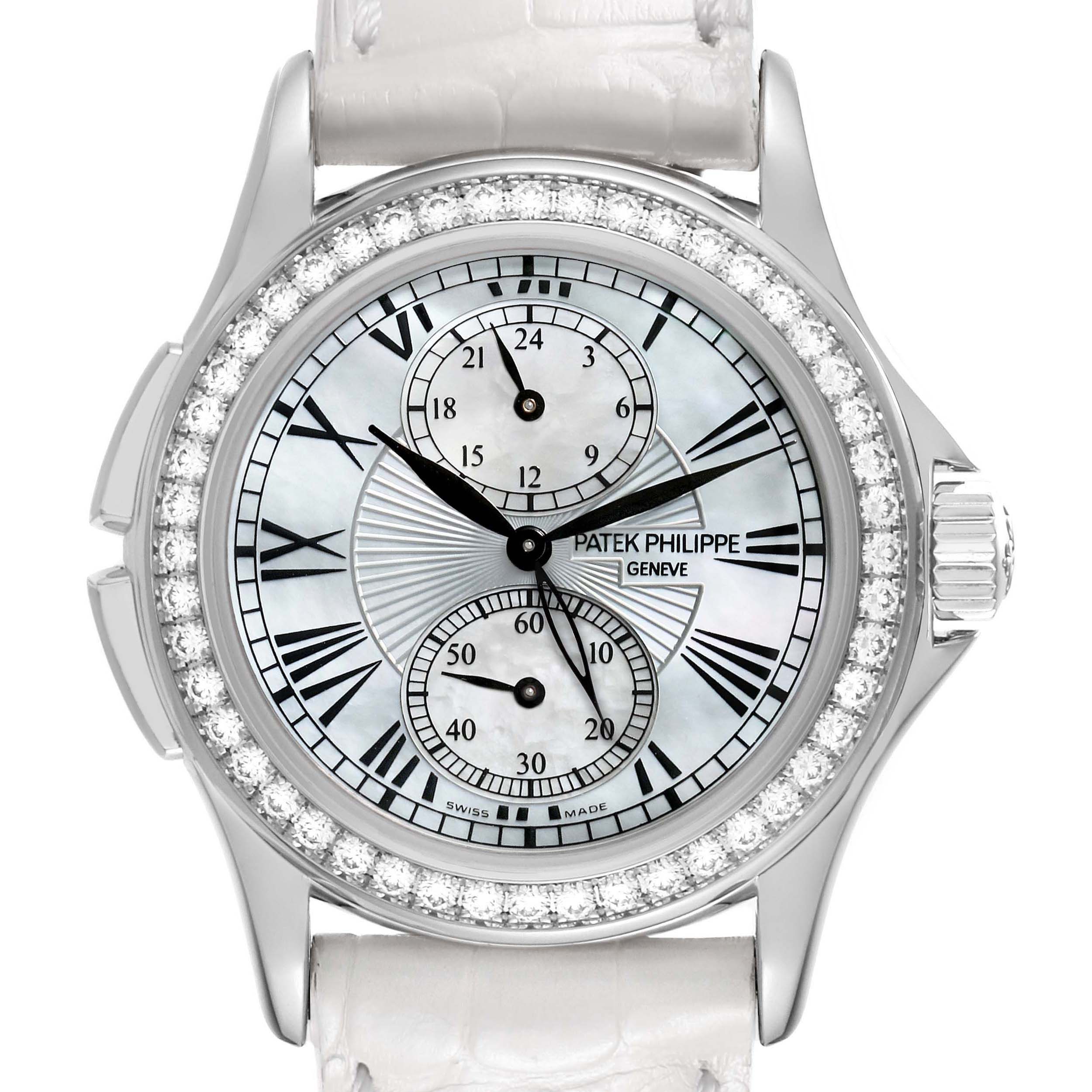 The Patek Philippe Calatrava 4934G-001 Women's White Gold Mother of Pearl Dial watch is shown from a front angle, highlighting its diamond bezel and intricate dial design.