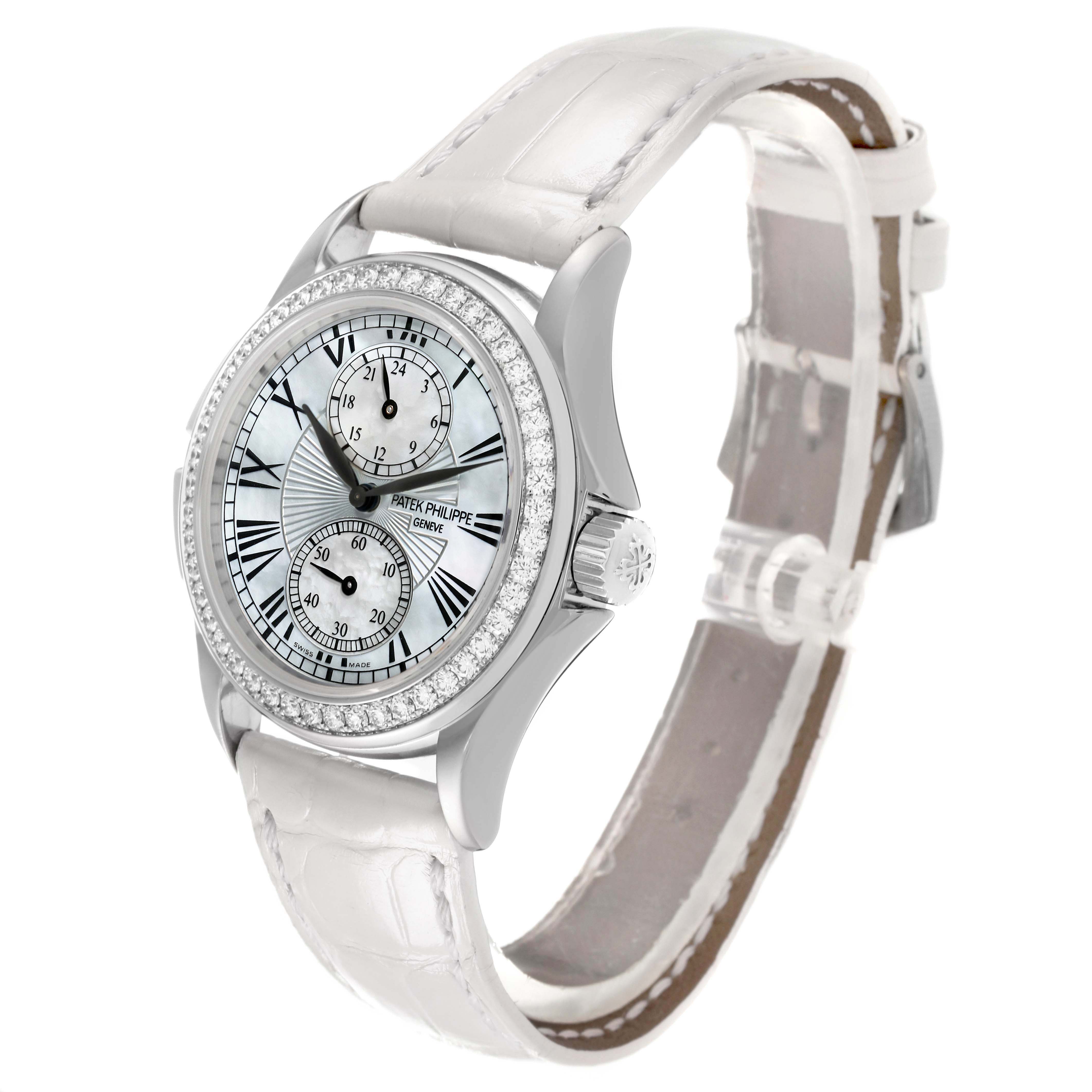 The Patek Philippe Calatrava 4934G-001 Women's White Gold Mother of Pearl Dial watch is shown at a three-quarter angle, displaying the face, crown, and part of the strap.