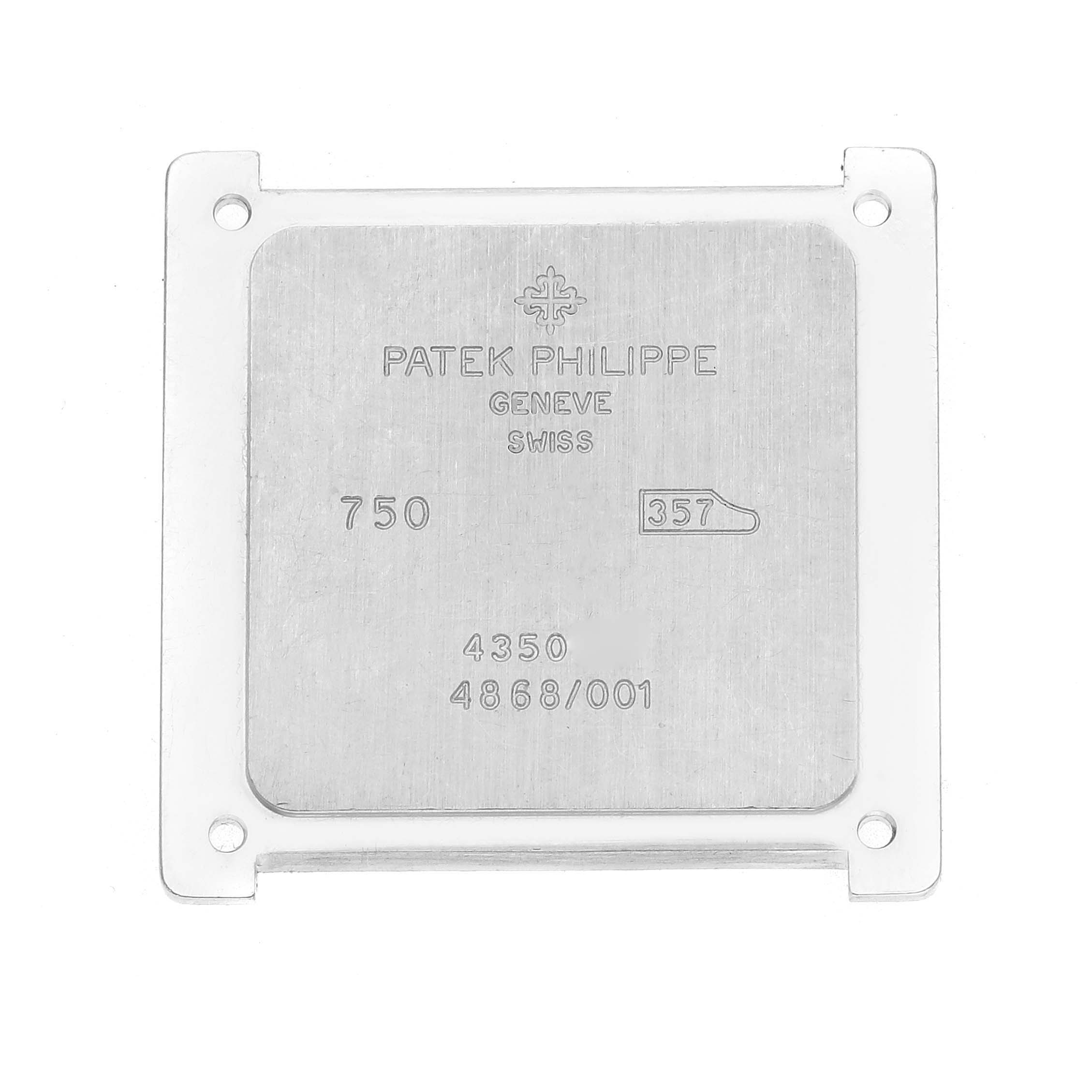 The image shows the case back of a Patek Philippe Gondolo 4868/001 Women's White Gold White Dial 4868/001 Women's White Gold White Dial watch from the inside, featuring engraved details and markings.