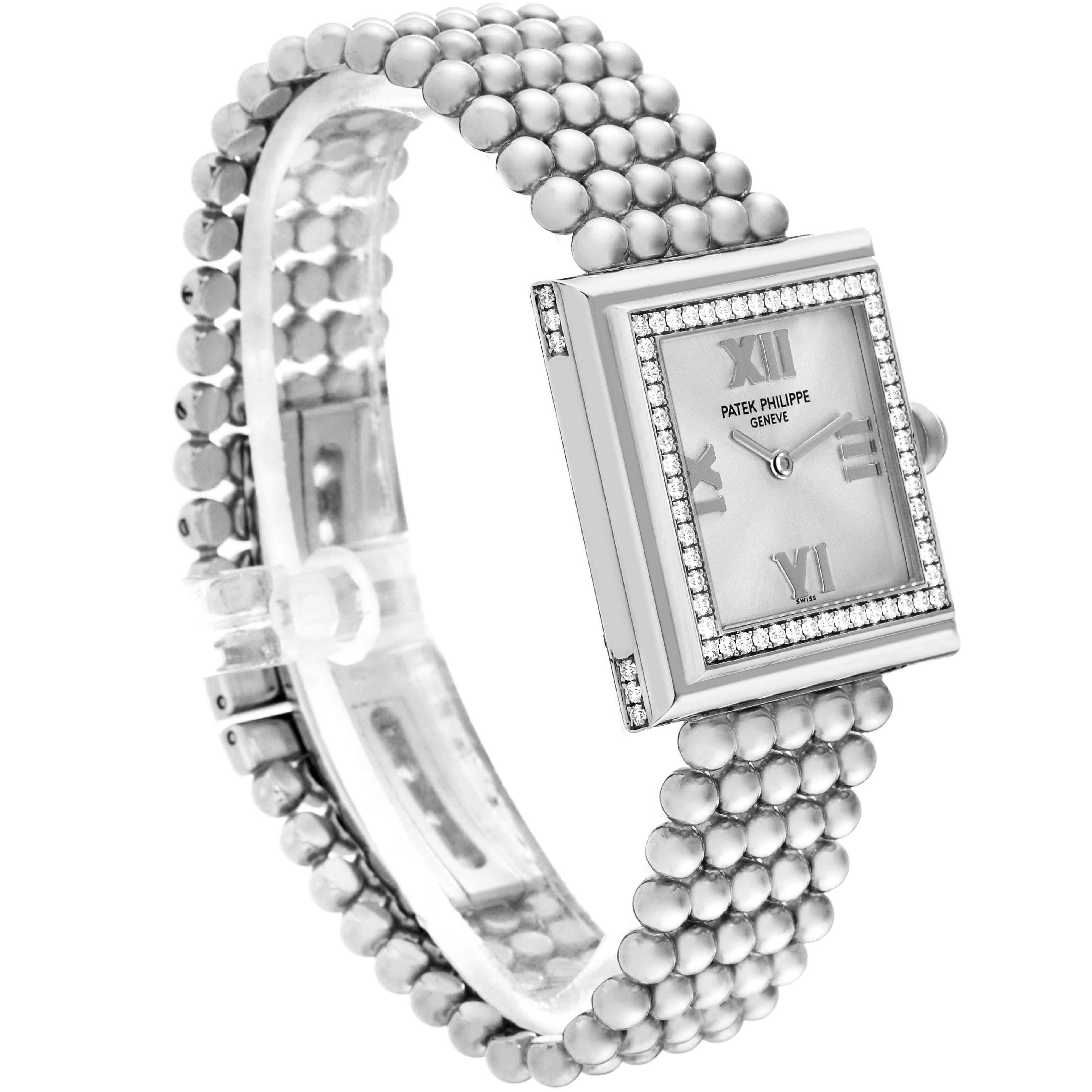 The Patek Philippe Gondolo 4868/001 Women's White Gold White Dial 4868/001 Women's White Gold White Dial watch is shown at a three-quarter angle, highlighting its rectangular face, beaded bracelet, and diamond accents.