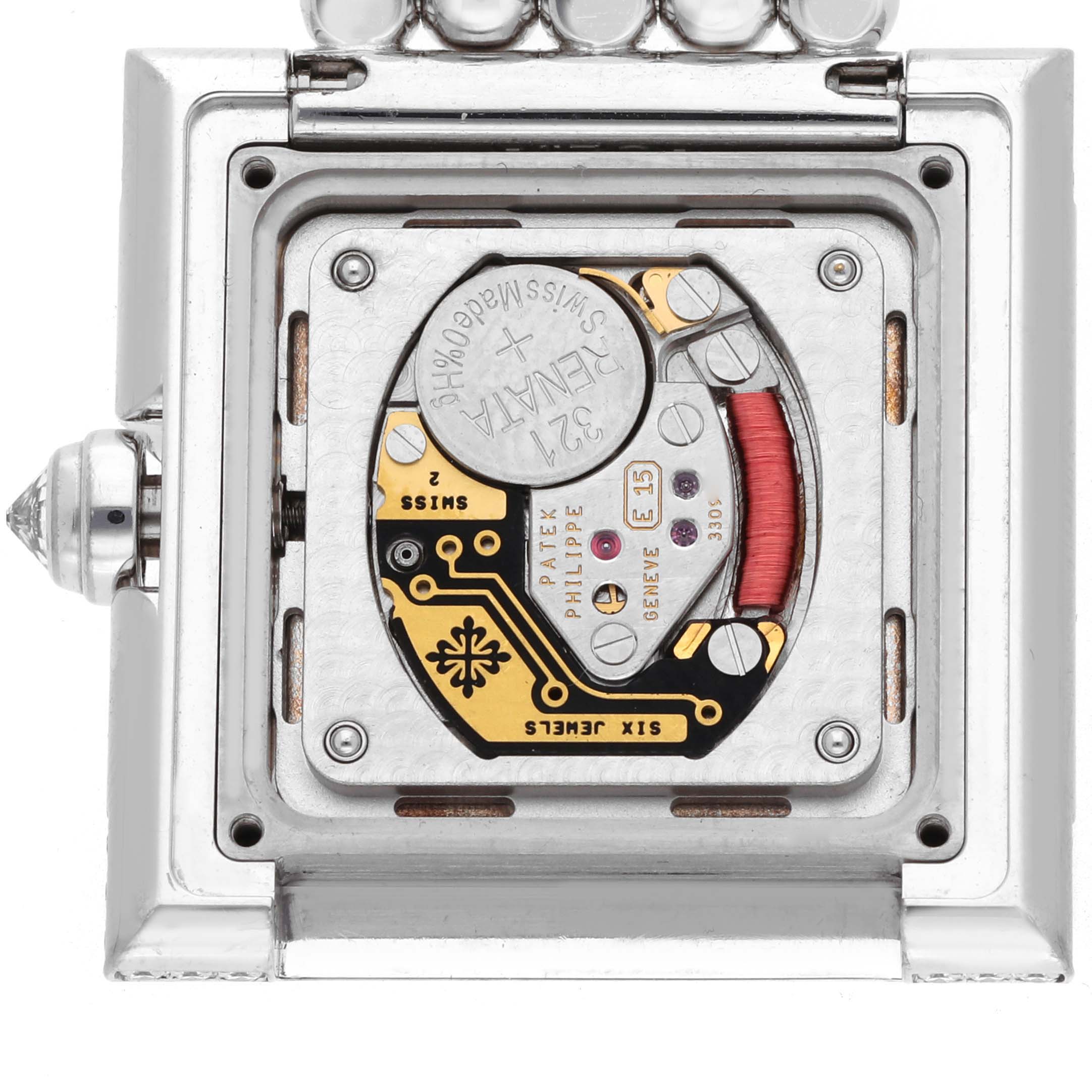 The image shows the back view of a Patek Philippe Gondolo 4868/001 Women's White Gold White Dial 4868/001 Women's White Gold White Dial watch, highlighting its internal movement and components.