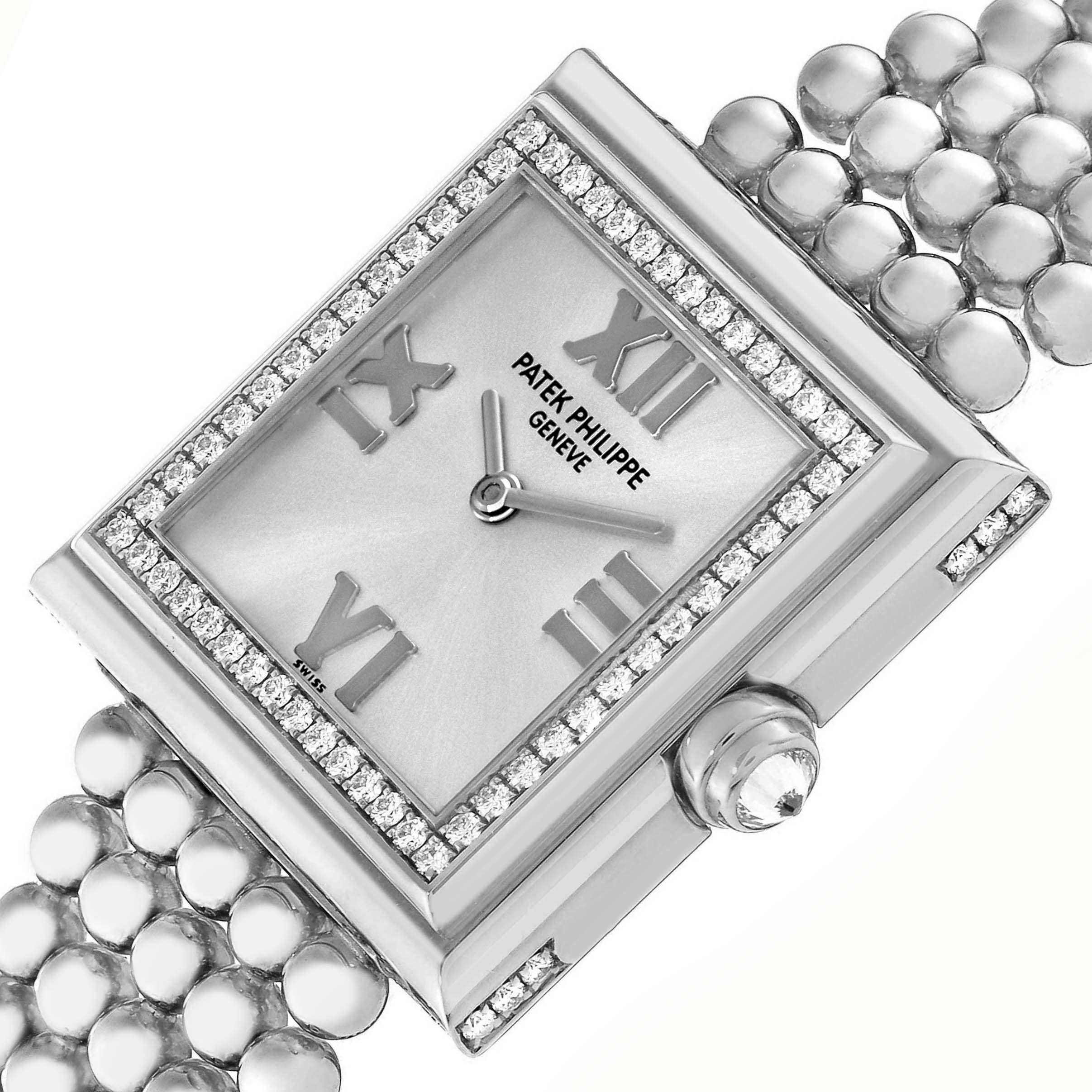 The Patek Philippe Gondolo 4868/001 Women's White Gold White Dial 4868/001 Women's White Gold White Dial watch is shown at an angle highlighting the rectangular diamond-encrusted bezel, face, and part of the bracelet.