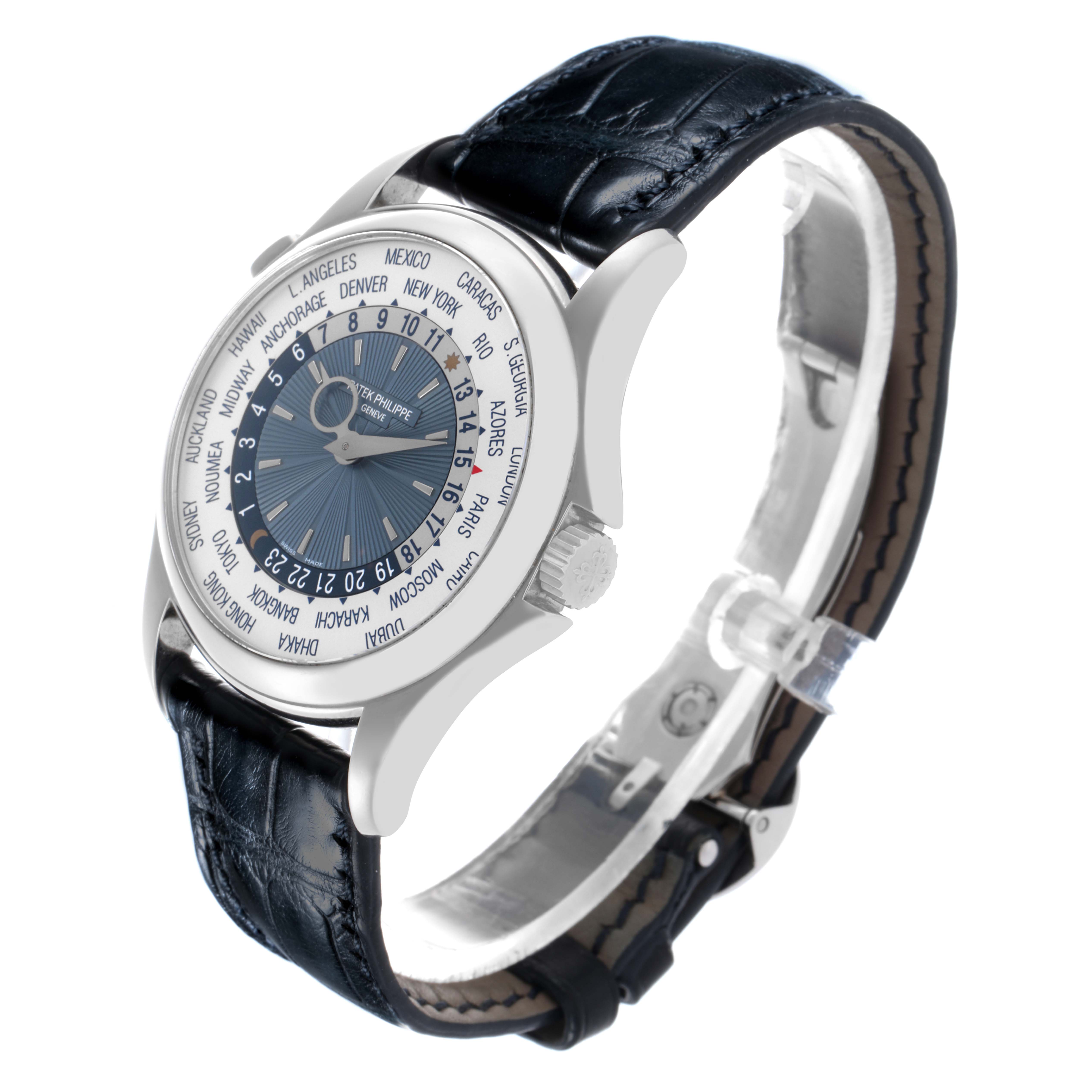 The Patek Philippe Complications 5130P-001 Men's Platinum Silver Dial 5130P-001 Men's Platinum Silver Dial watch is shown at a slight angle, featuring the dial, bezel, case, and leather strap.