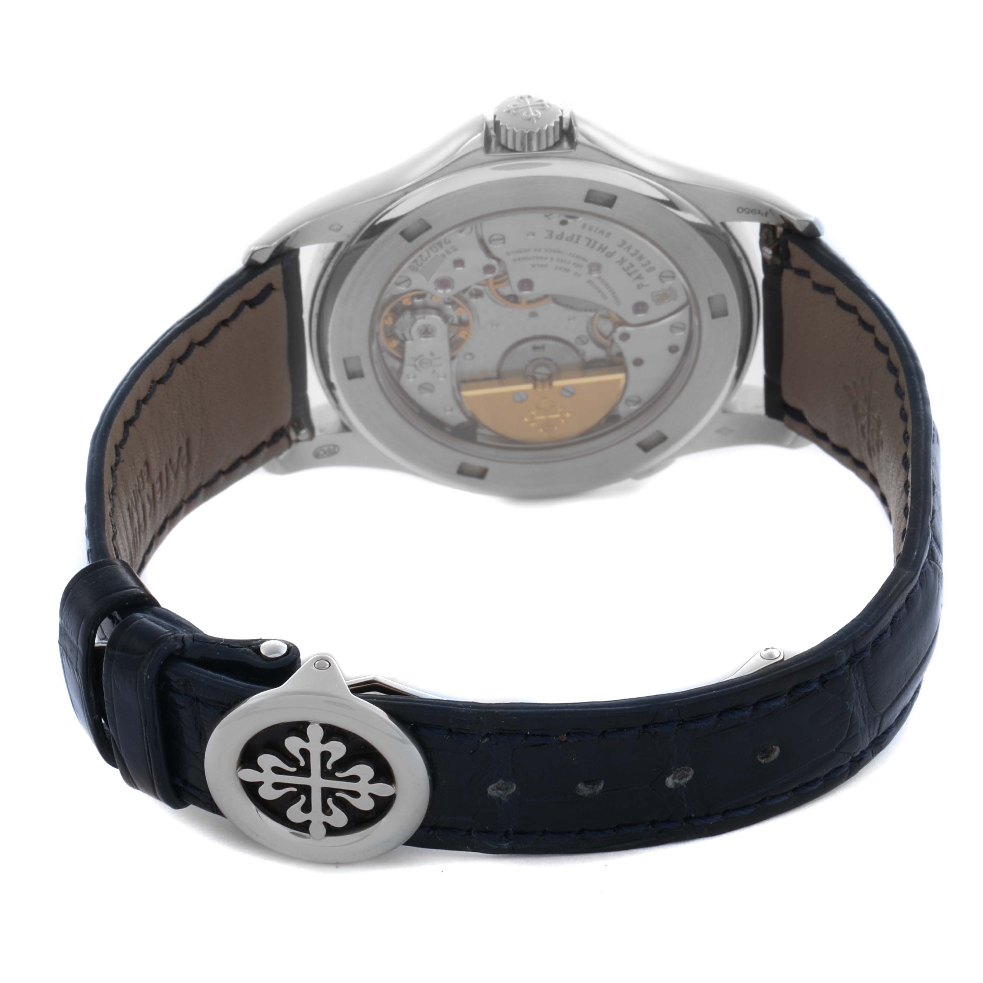 The image shows the back view of a Patek Philippe Complications 5130P-001 Men's Platinum Silver Dial 5130P-001 Men's Platinum Silver Dial watch, highlighting its movement and the buckle with logo.