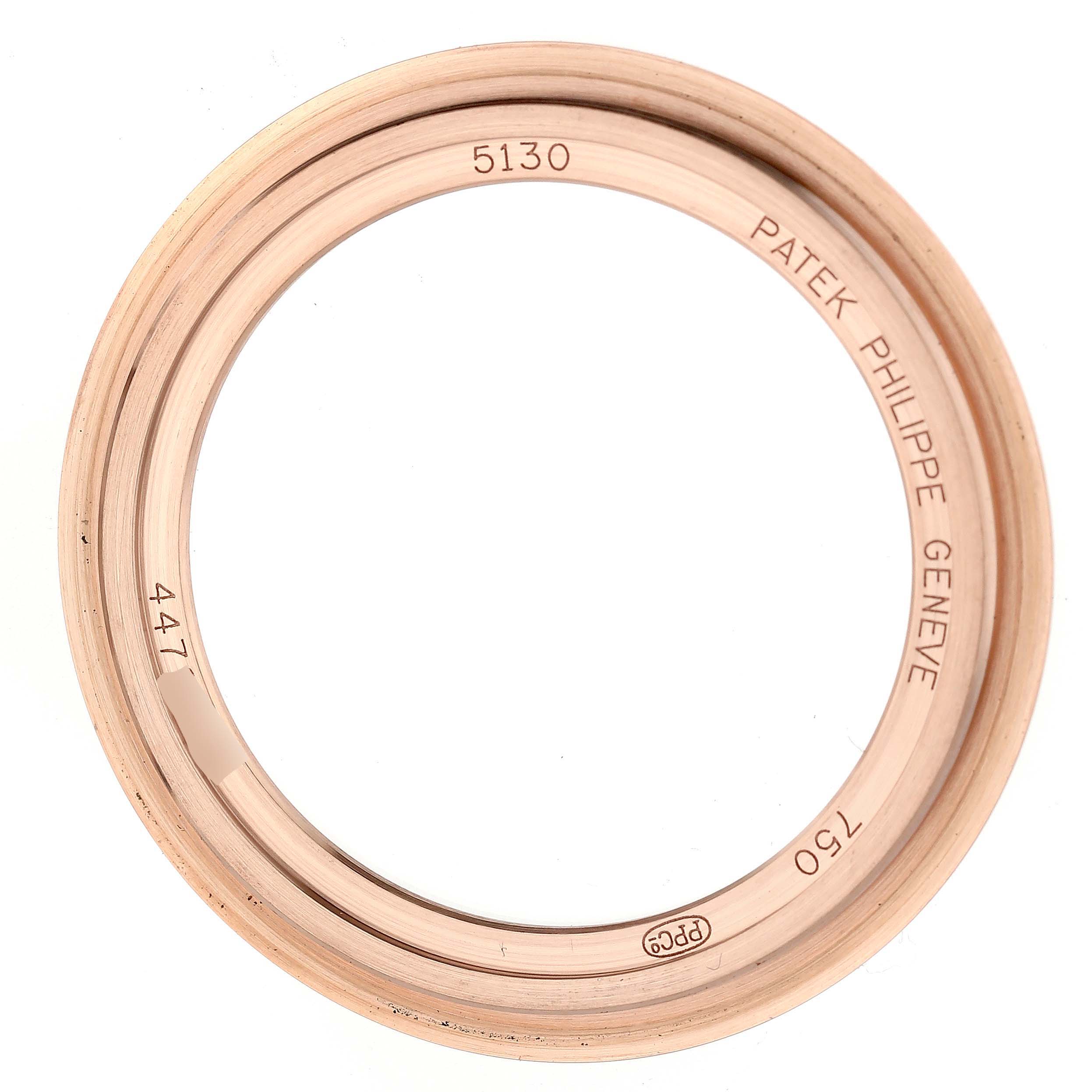 This is the 5130 bezel of a Patek Philippe Complications 5130R-001 Men
s Rose Gold Silver Dial 5130R-001 Men
s Rose Gold Silver Dial watch, viewed from above.