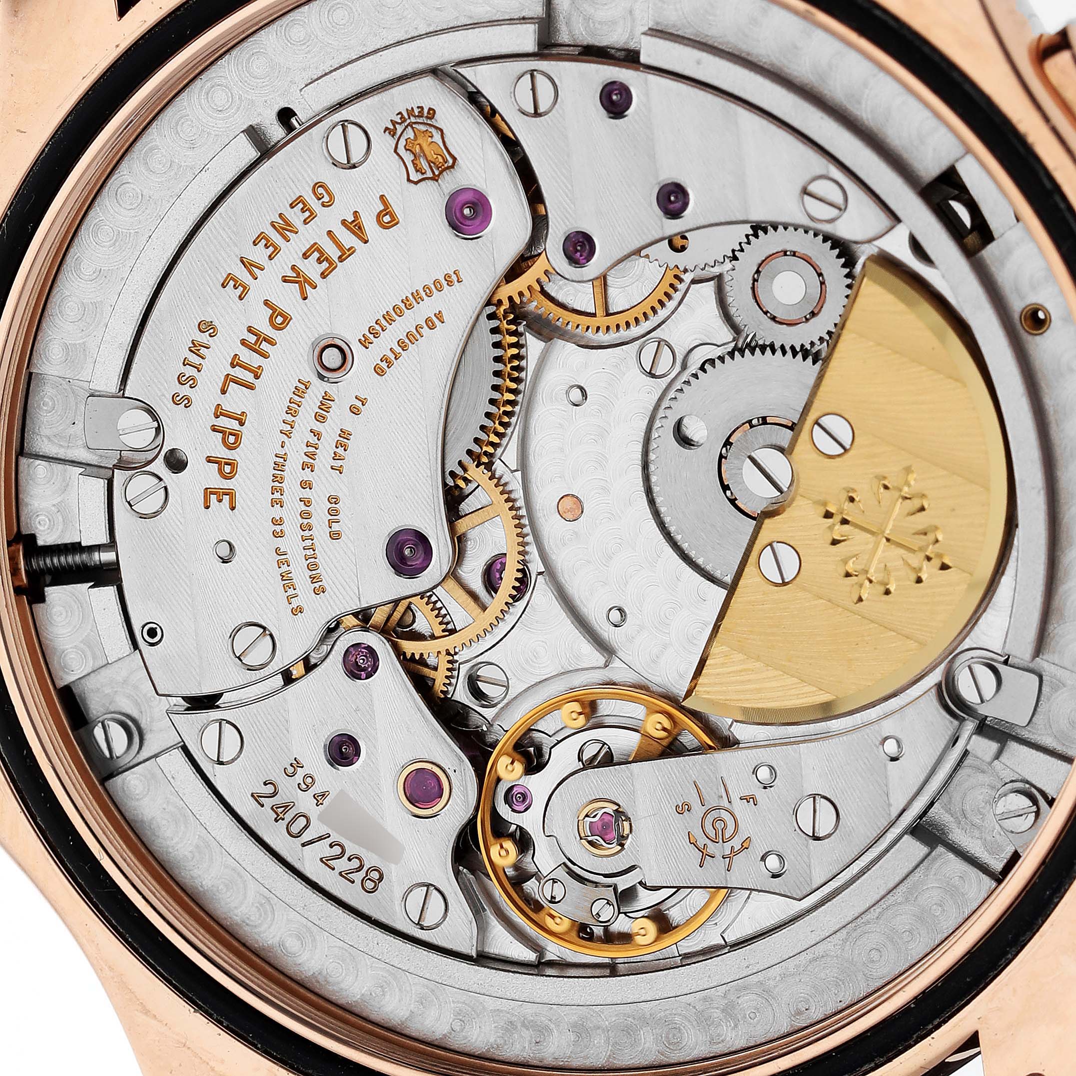 This image shows a close-up of the movement mechanism of a Patek Philippe Complications 5130R-001 Men
s Rose Gold Silver Dial 5130R-001 Men
s Rose Gold Silver Dial watch.