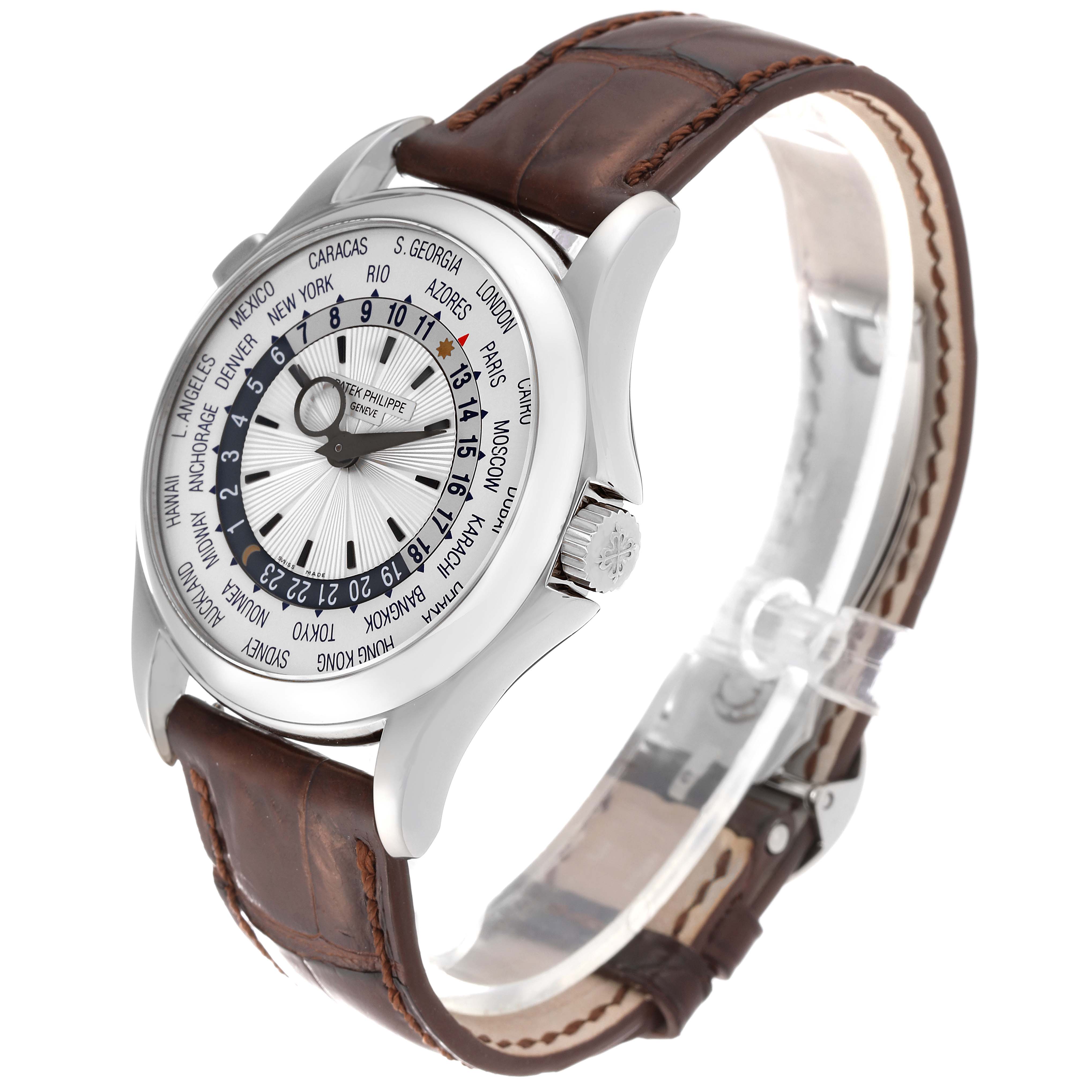 This image shows a Patek Philippe Complications 5130G-001 Men
s White Gold Silver Dial 5130G-001 Men
s White Gold Silver Dial watch at a slight angle, highlighting the face, crown, and leather strap.