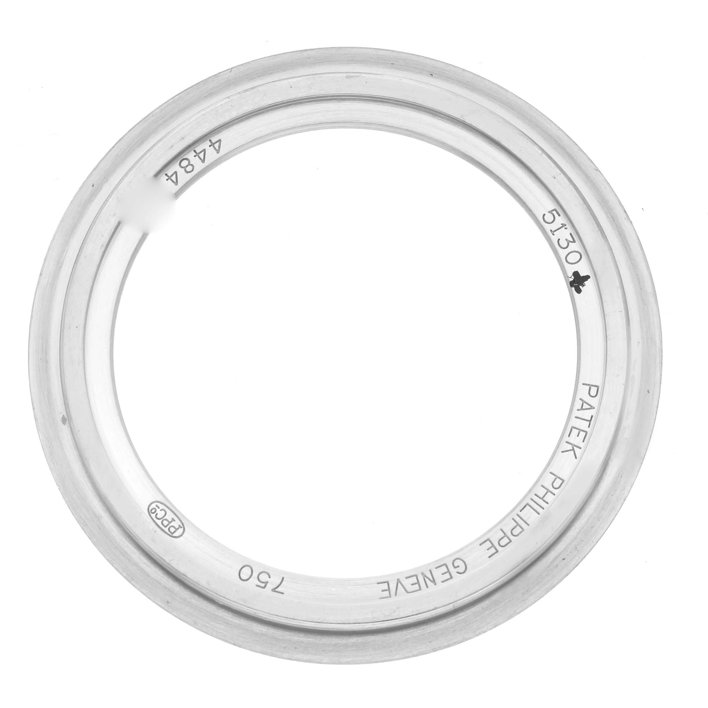 This image shows a circular bezel for the Patek Philippe Complications 5130G-001 Men
s White Gold Silver Dial 5130G-001 Men
s White Gold Silver Dial model 5130, marked with "Patek Philippe Geneve 750."