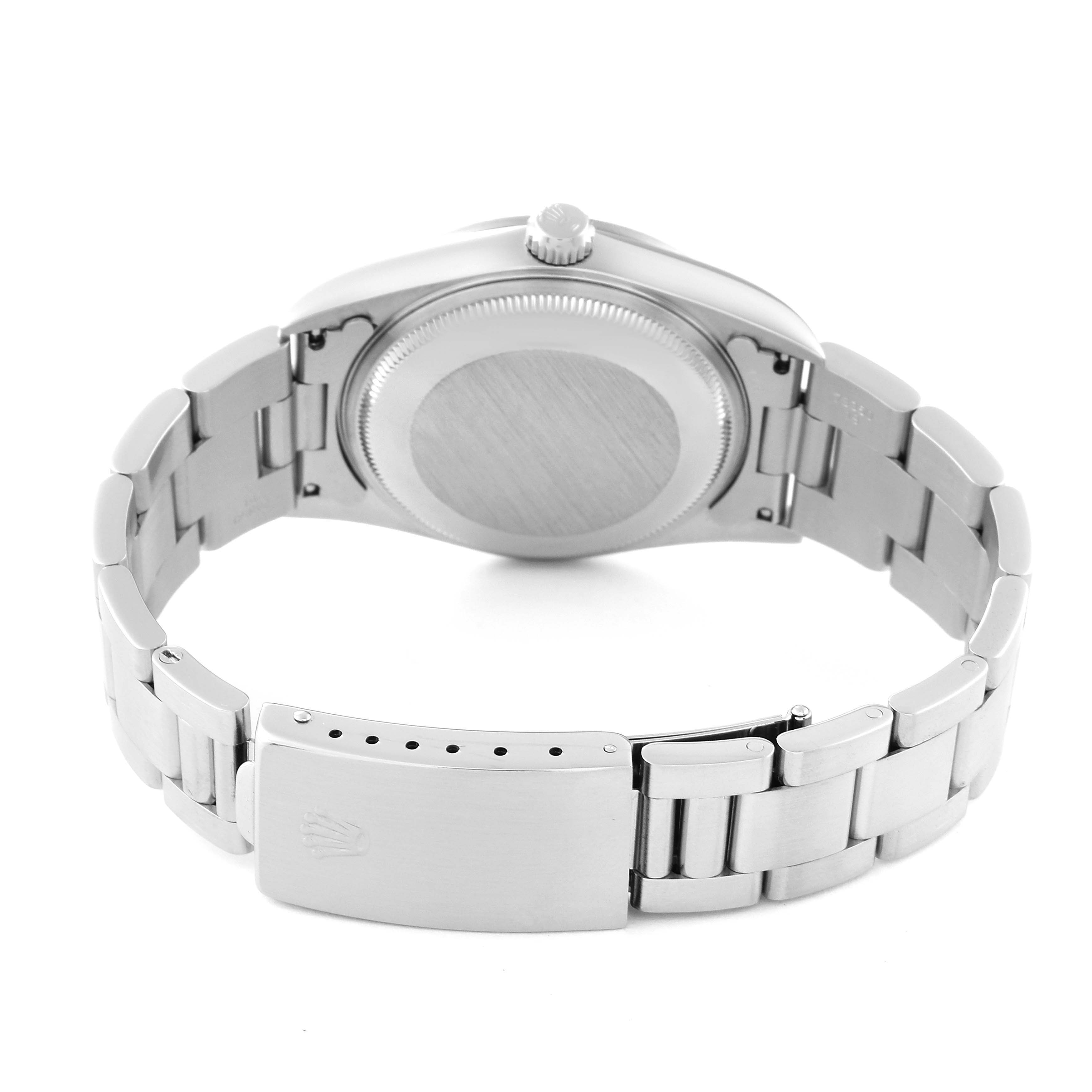 The image shows the back case and bracelet of a Rolex Air-King 14000 Men's Stainless Steel White Dial 14000 Men's Stainless Steel White Dial watch, with the clasp partially open.