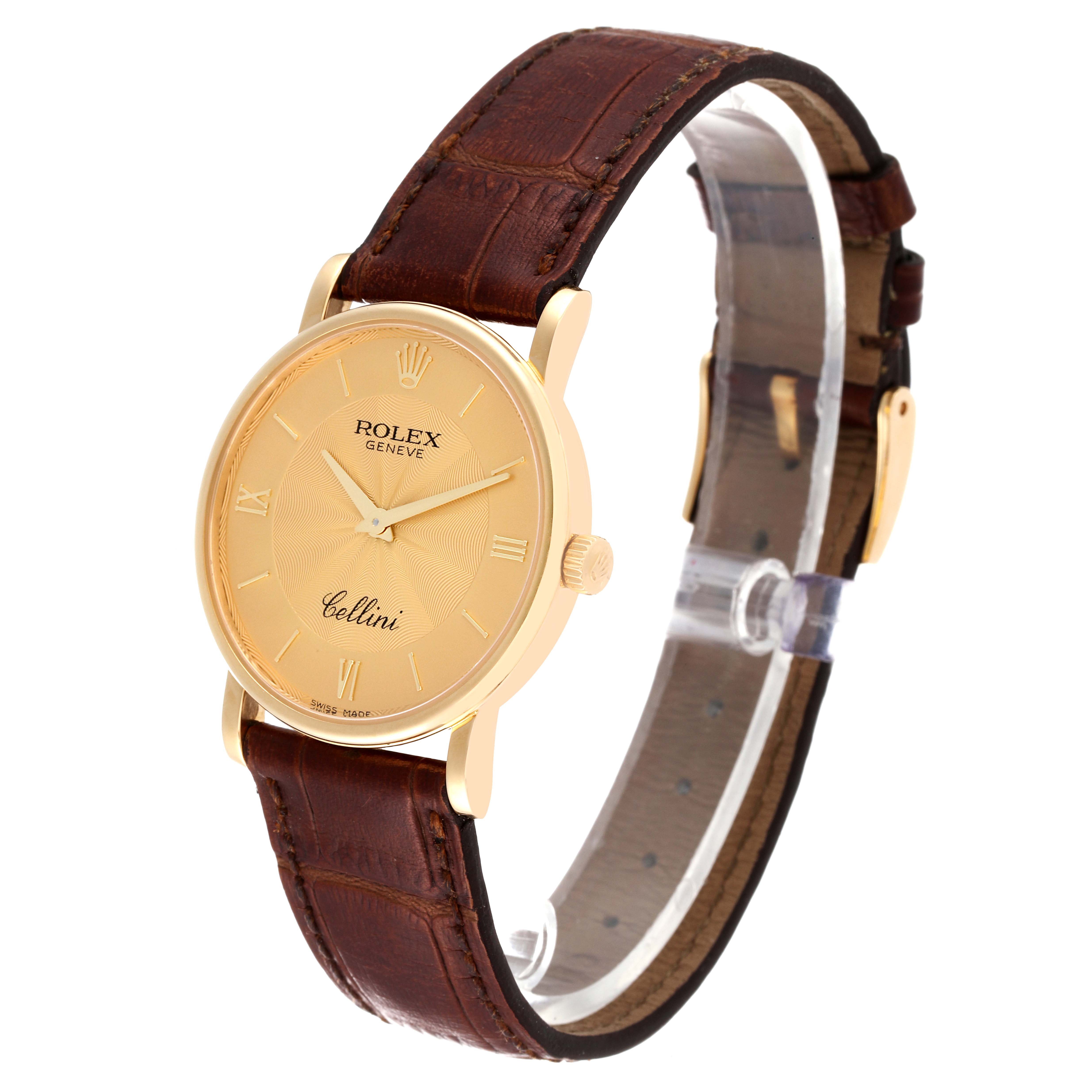 The Rolex Cellini 5115 Men's Yellow Gold Champagne Dial 5115 Men's Yellow Gold Champagne Dial watch is shown from a front-right angle, displaying its face and brown leather strap.