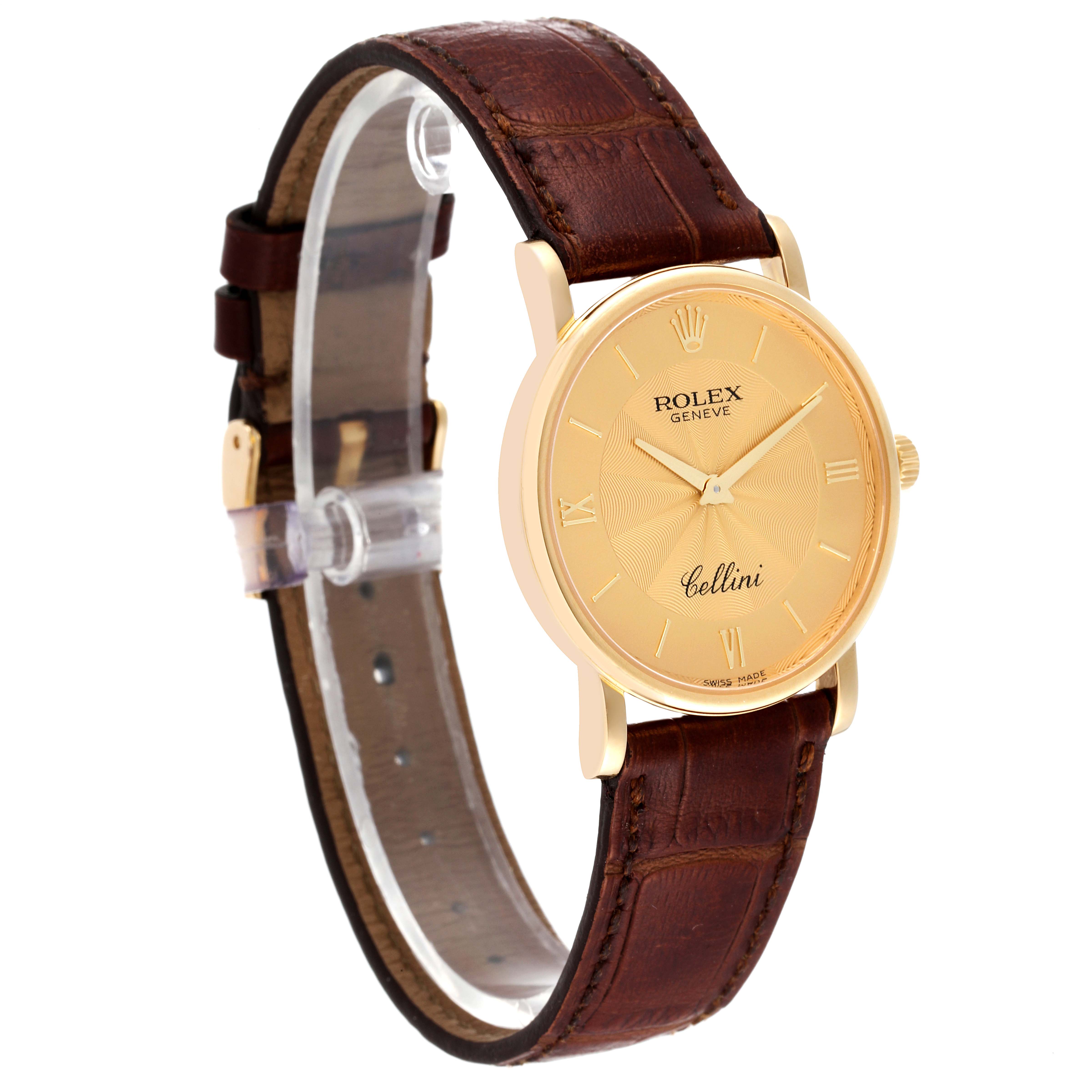 The Rolex Cellini 5115 Men's Yellow Gold Champagne Dial 5115 Men's Yellow Gold Champagne Dial watch is shown at a slight angle with a clear view of its face and brown leather strap.