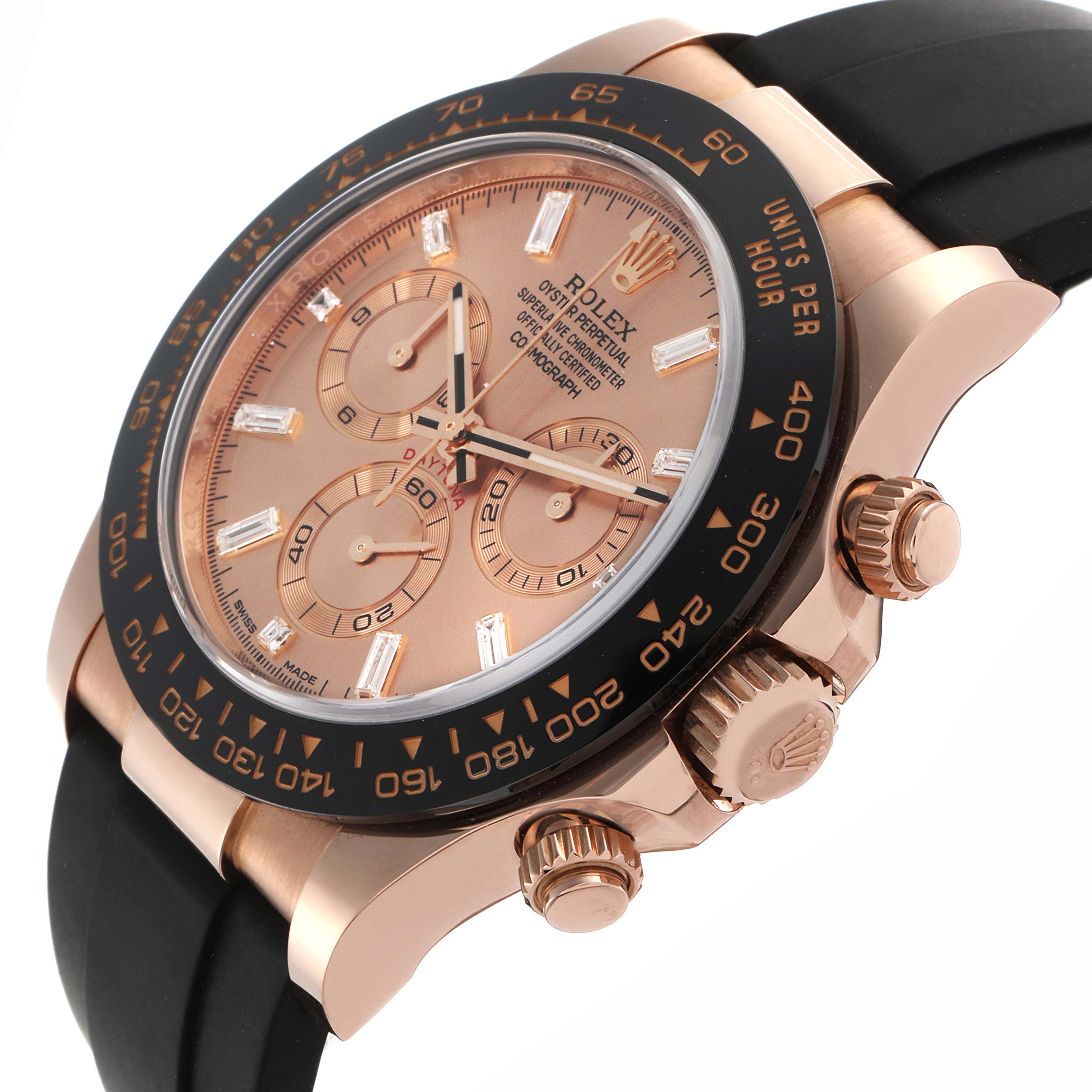 The Rolex Daytona 116515LN Men's Rose Gold Pink Dial 116515LN Men's Rose Gold Pink Dial watch is shown at an angled side view, highlighting the face, bezel, and pushers.