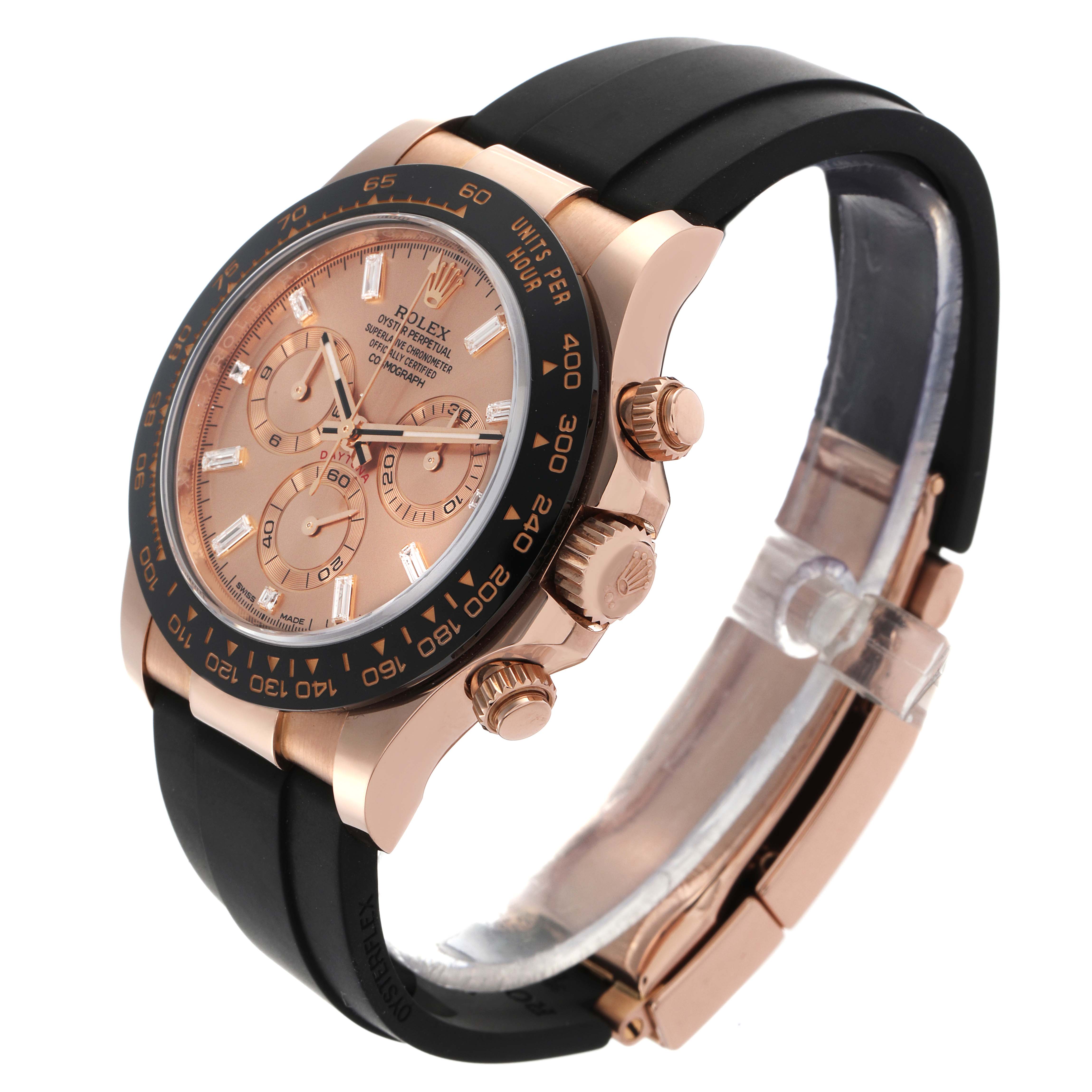The Rolex Daytona 116515LN Men's Rose Gold Pink Dial 116515LN Men's Rose Gold Pink Dial watch is shown at a side angle, highlighting the rose gold case, black bezel, and strap with visible dials and crown.