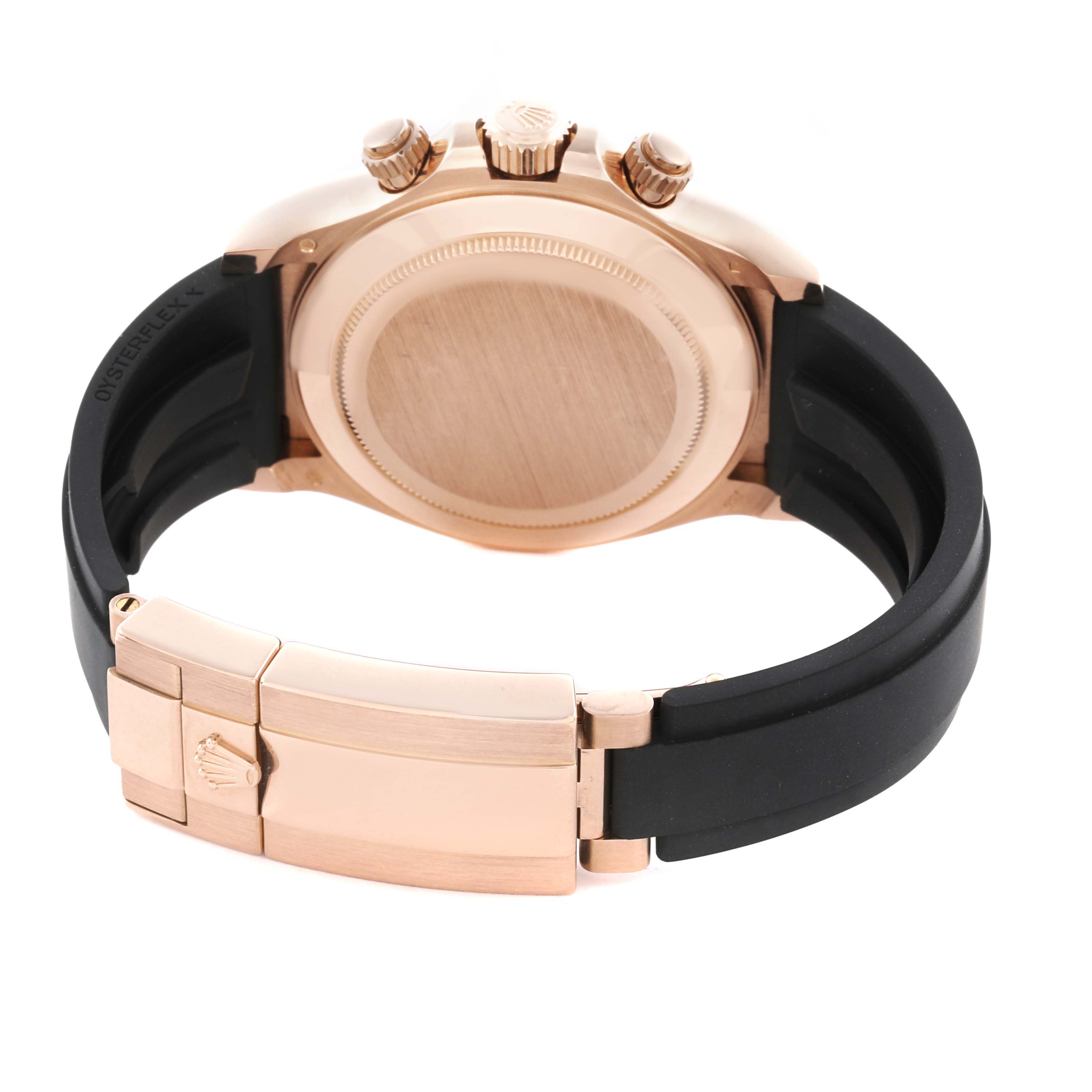 The image shows the back of a Rolex Daytona 116515LN Men's Rose Gold Pink Dial 116515LN Men's Rose Gold Pink Dial watch, highlighting the case back, crown, pushers, and the Oysterflex bracelet clasp.