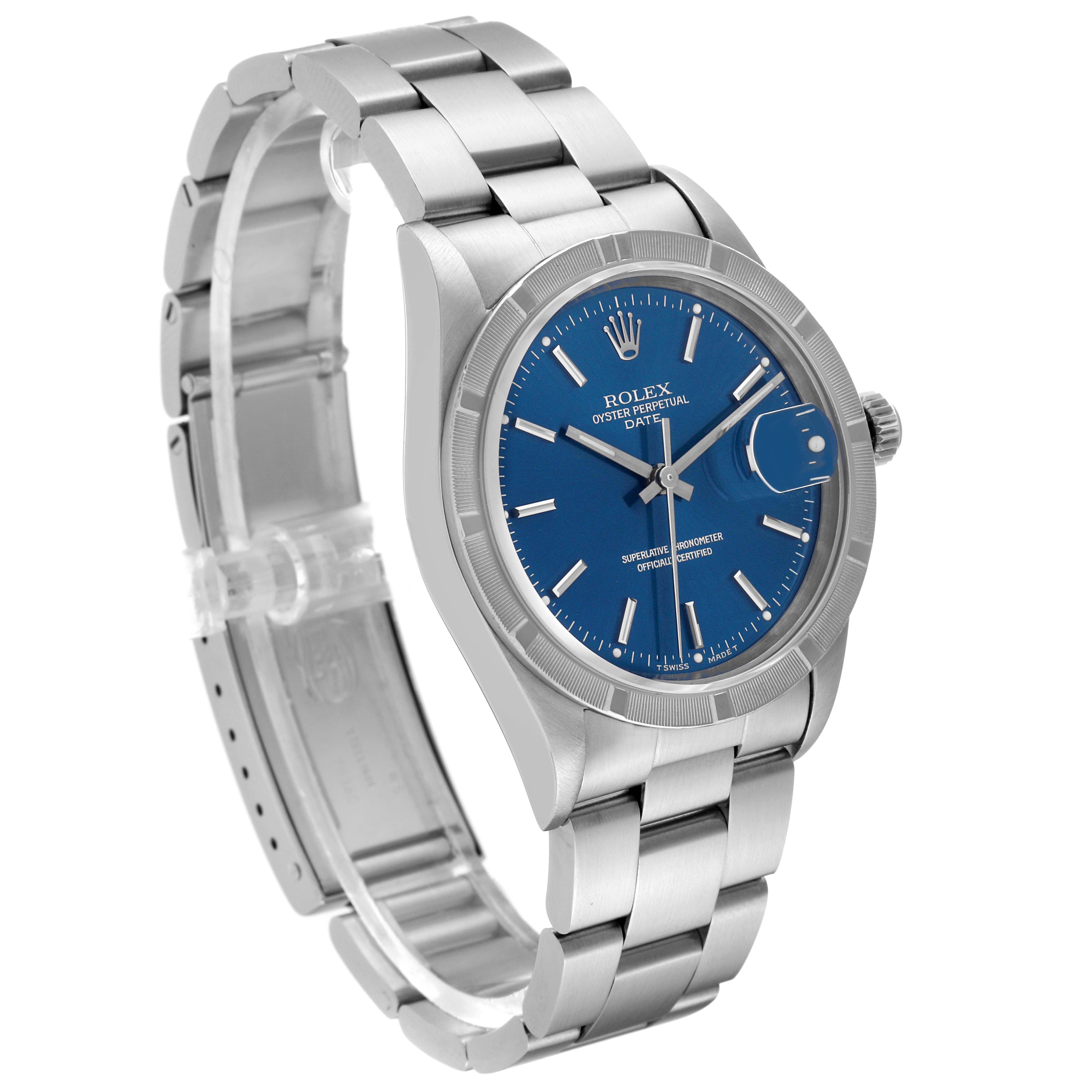 The image shows a Rolex Date 15210 Men's Stainless Steel Blue Dial 15210 Men's Stainless Steel Blue Dial model watch from an angled side view, highlighting the blue dial and silver bracelet.