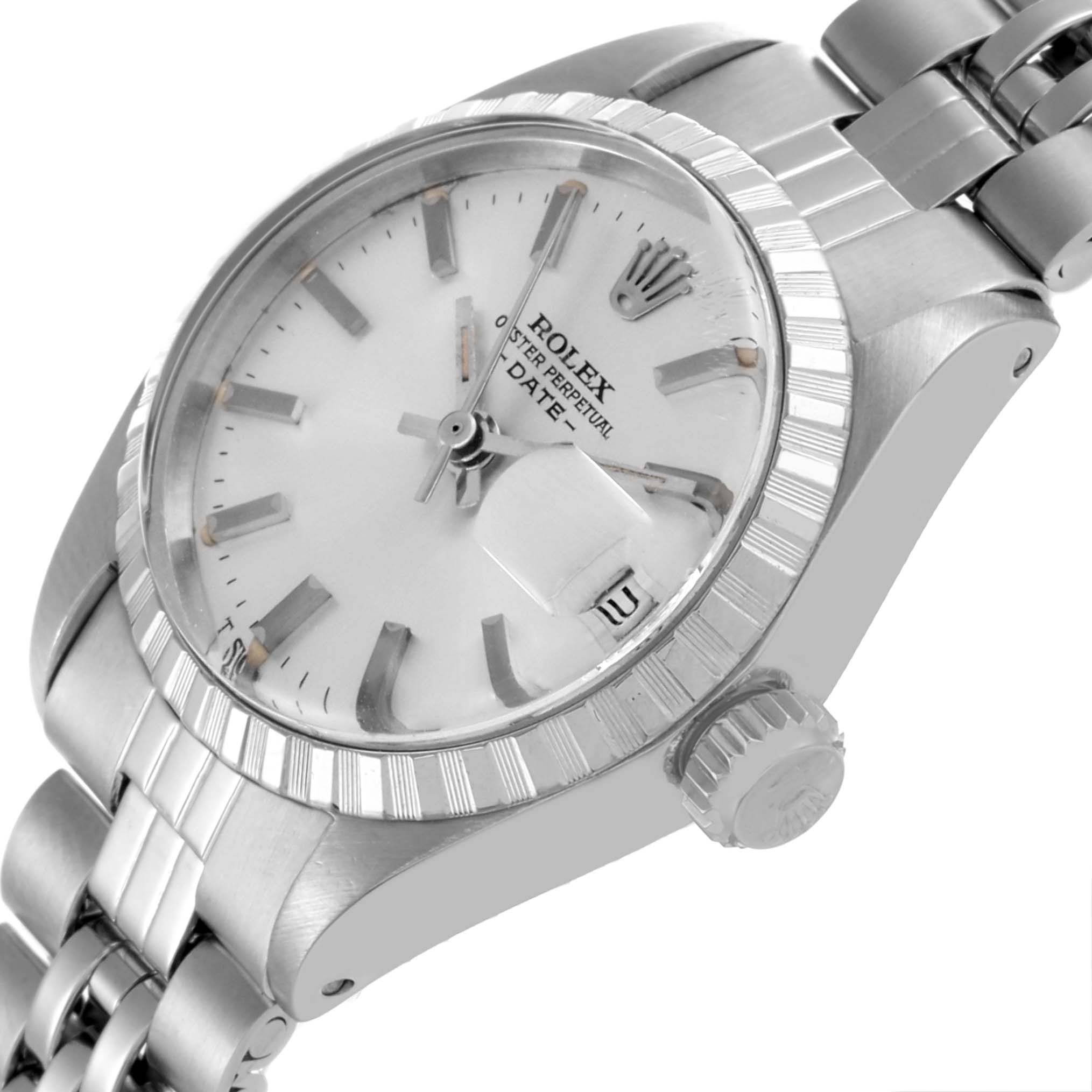 The Rolex Date 6924 Women
s Stainless Steel Silver Dial 6924 Women
s Stainless Steel Silver Dial model is shown at a three-quarter angle, displaying the face, bezel, crown, and part of the bracelet.